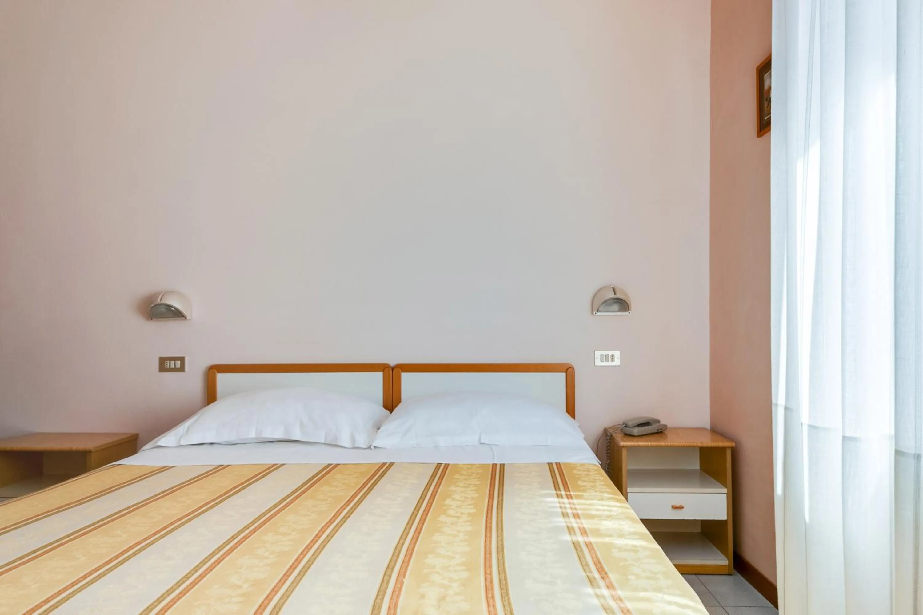 Bed in Hotel Sorriso