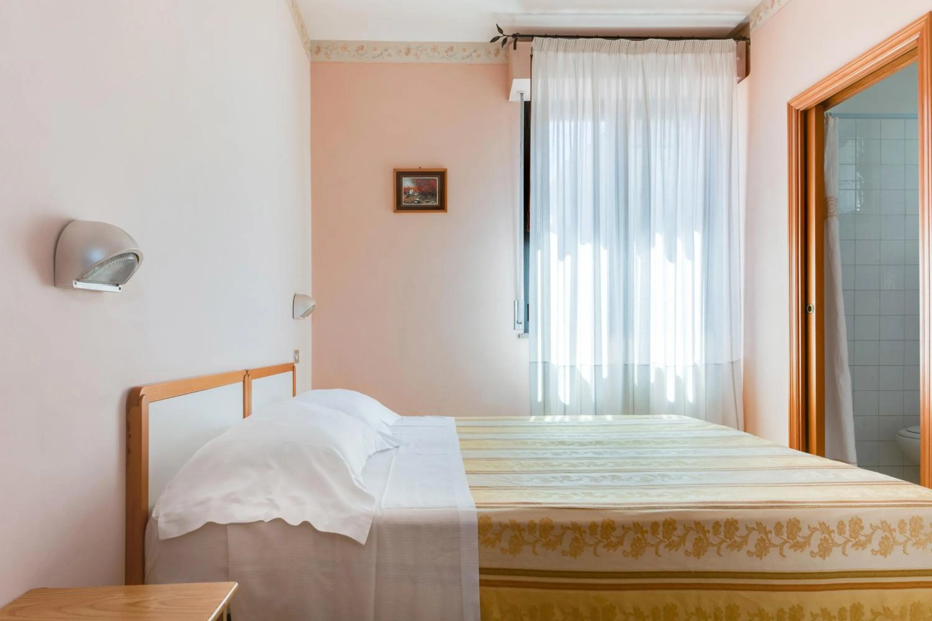 Bed in Hotel Sorriso