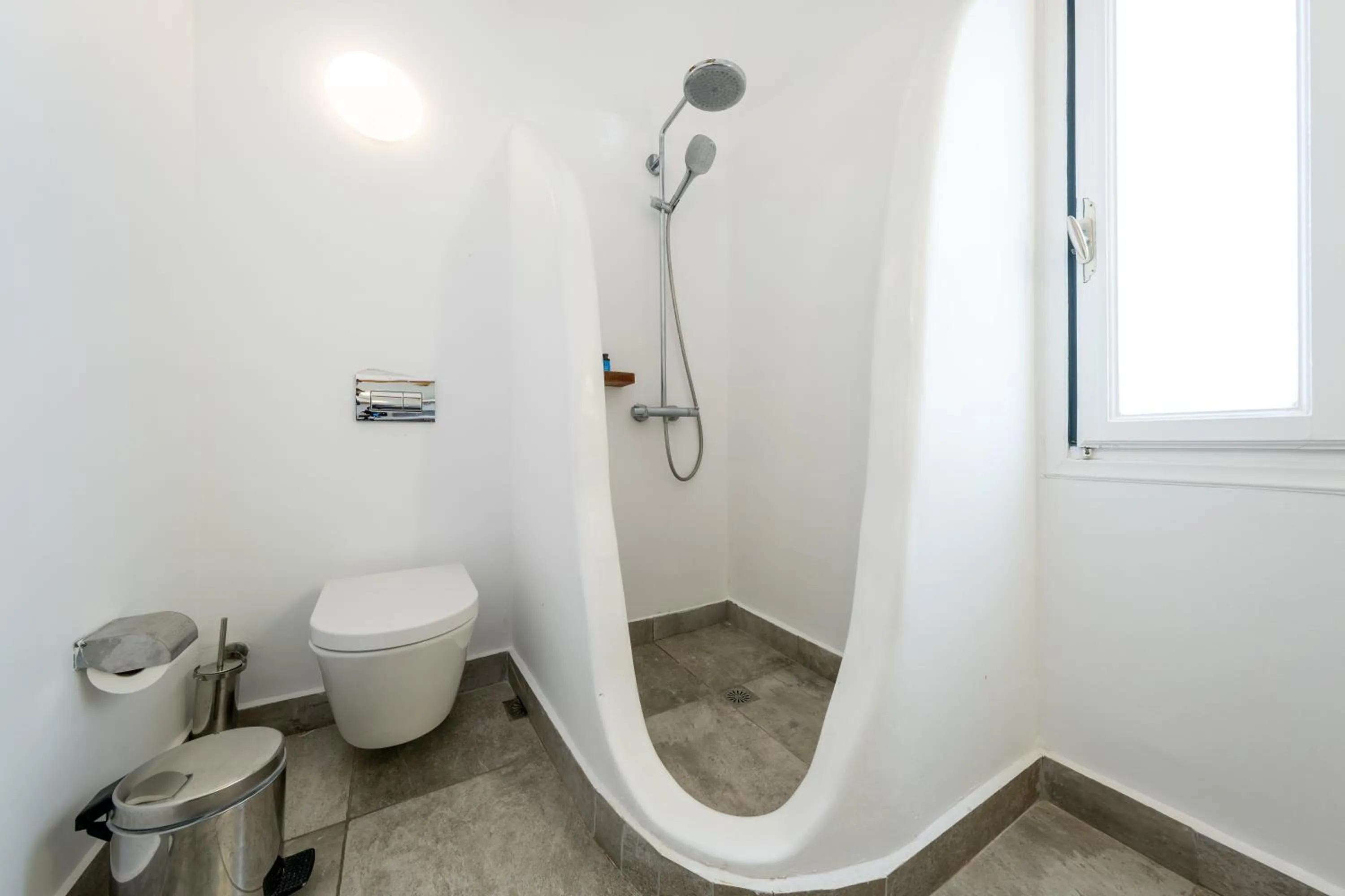 Shower in Amaze Suites