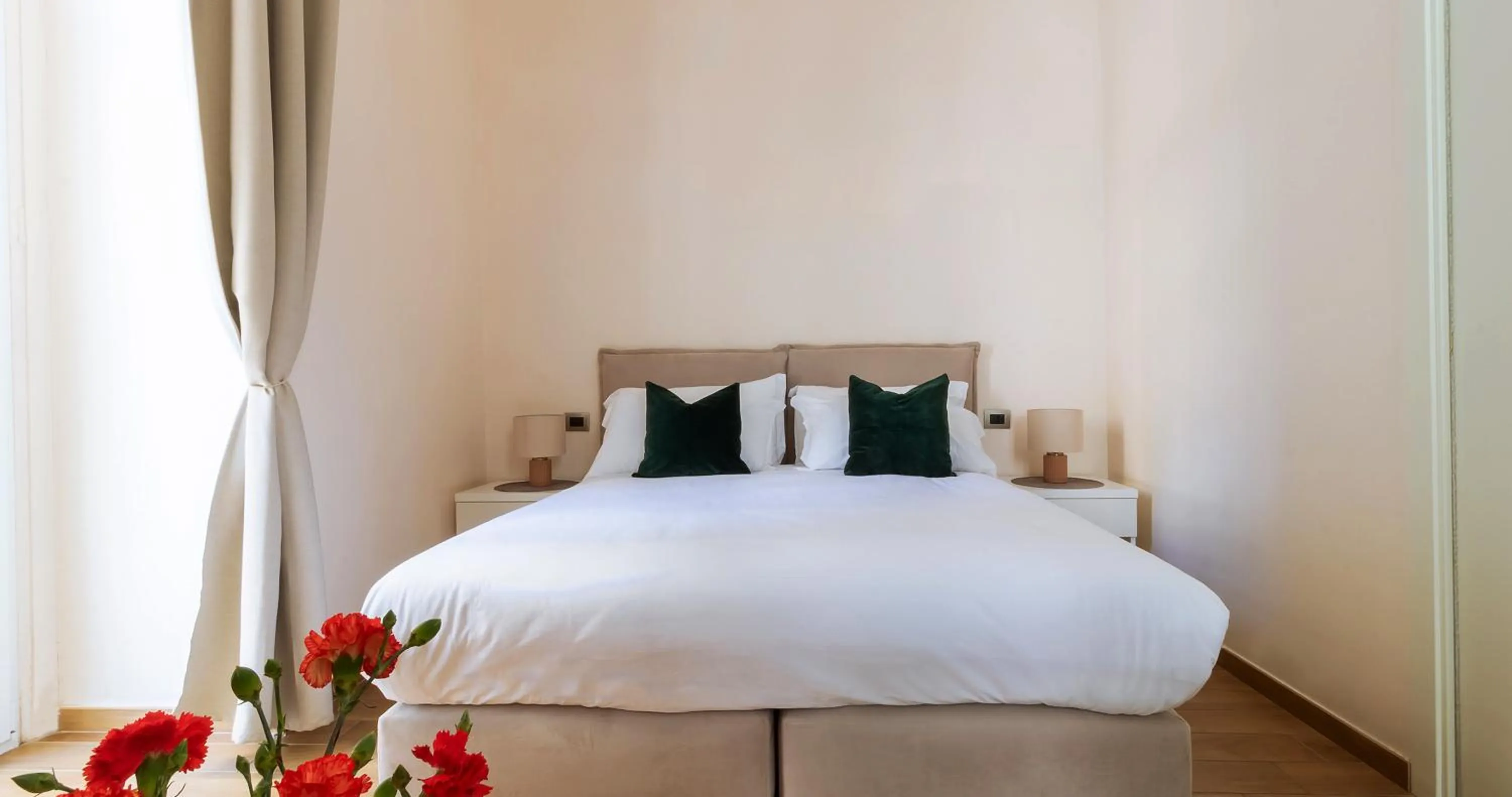 Bed in Musto Suites & Rooms