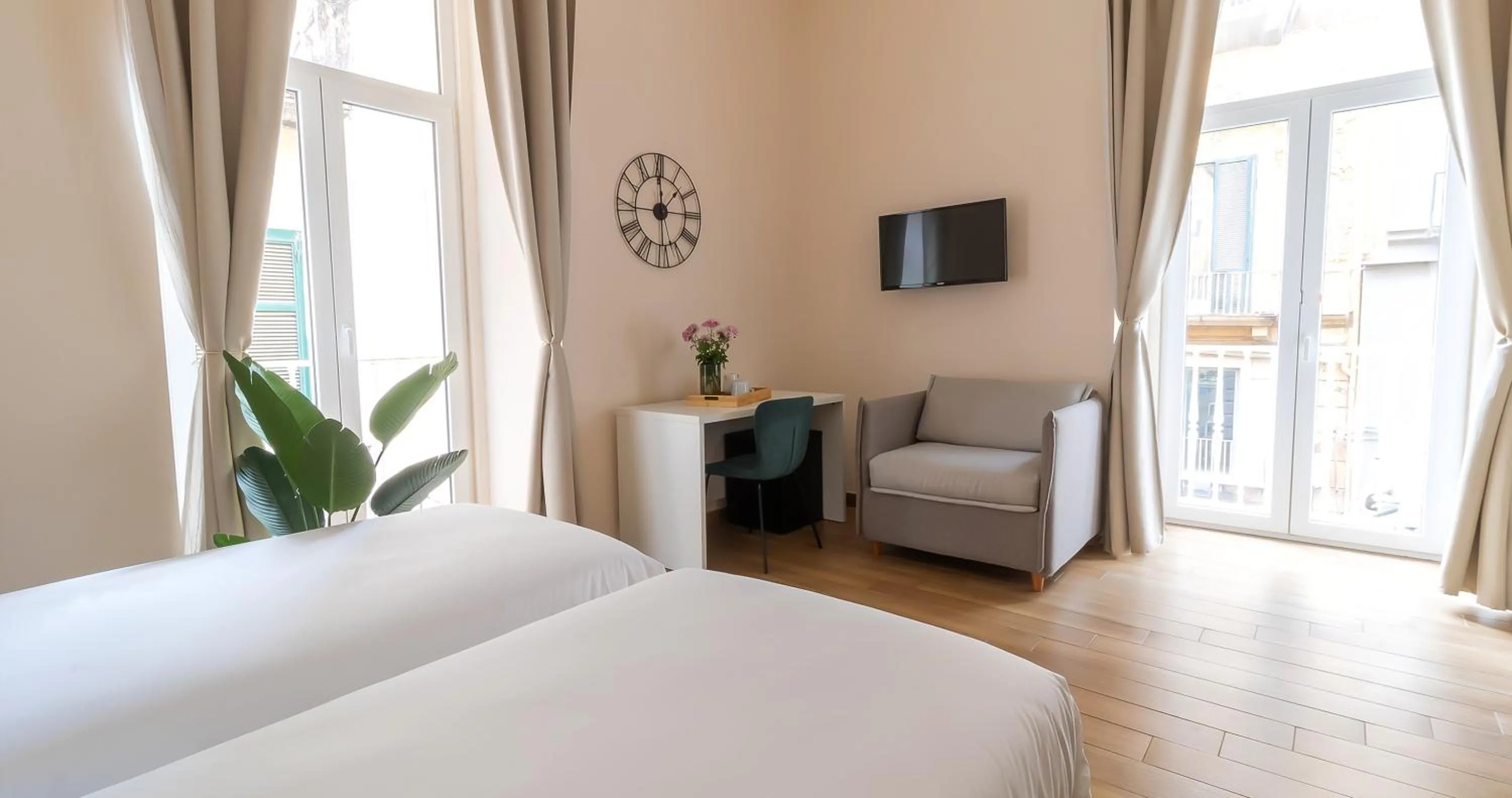 Bed in Musto Suites & Rooms