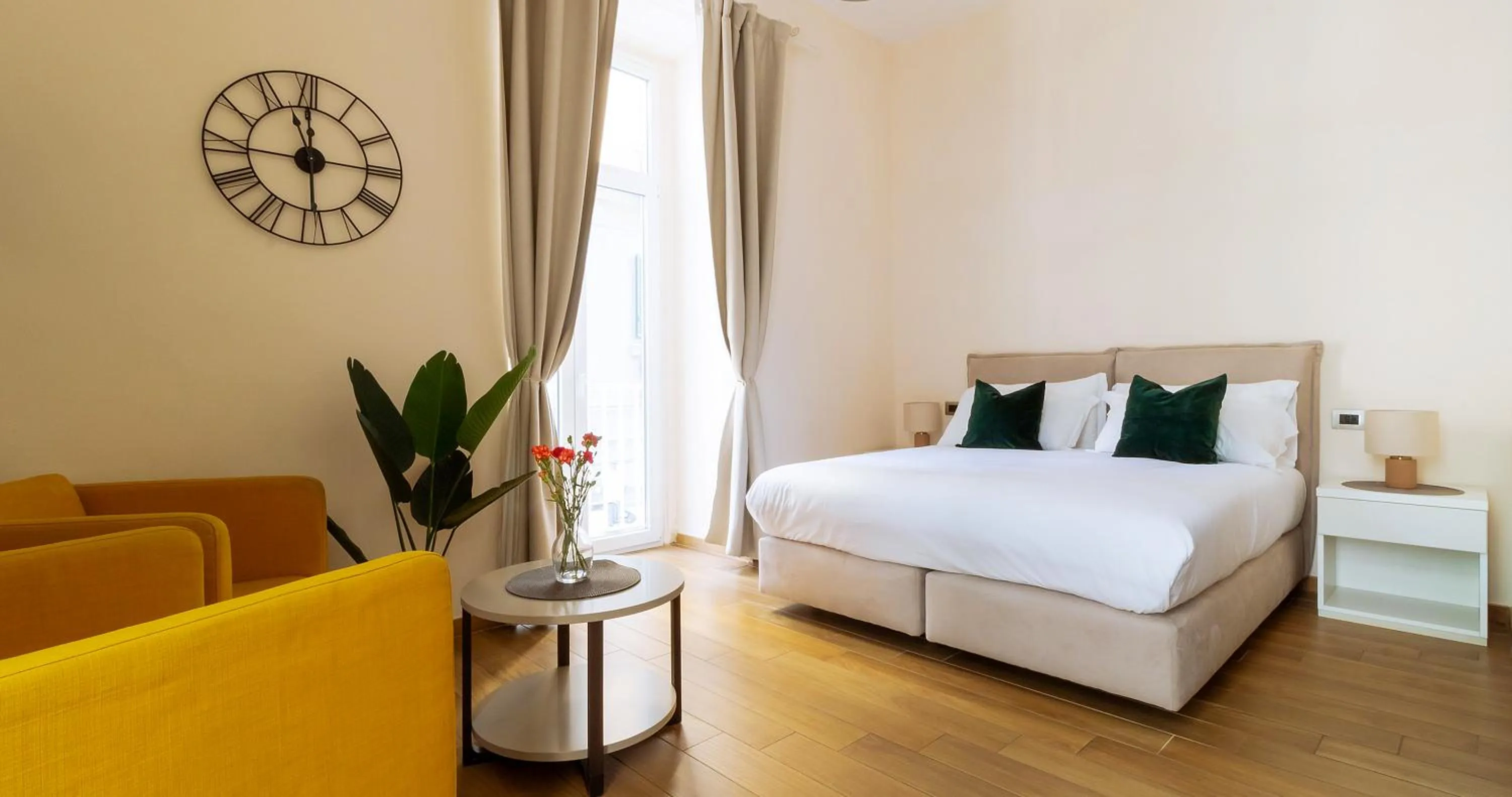 Bed in Musto Suites & Rooms