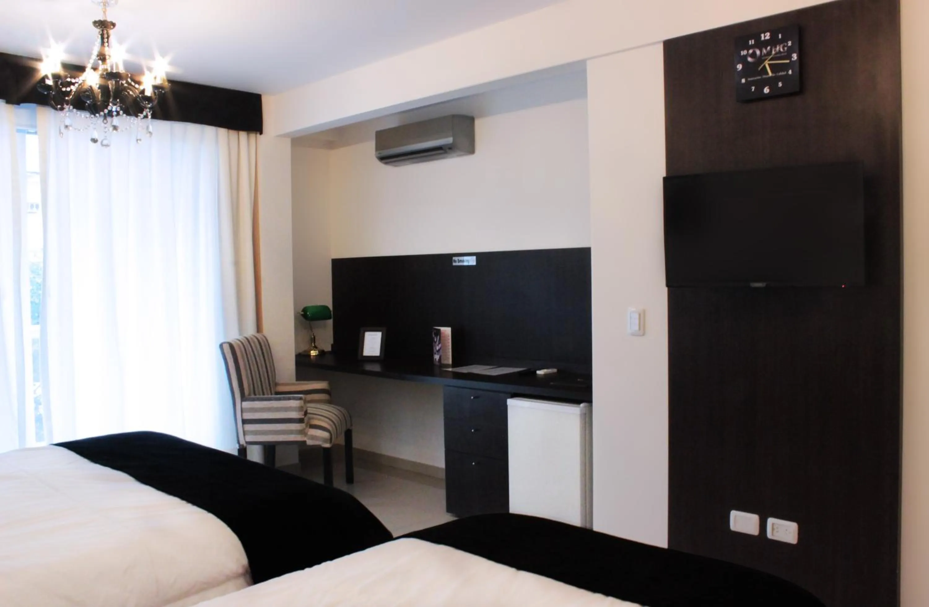 TV and multimedia, Bed in Hotel Boutique Devoto