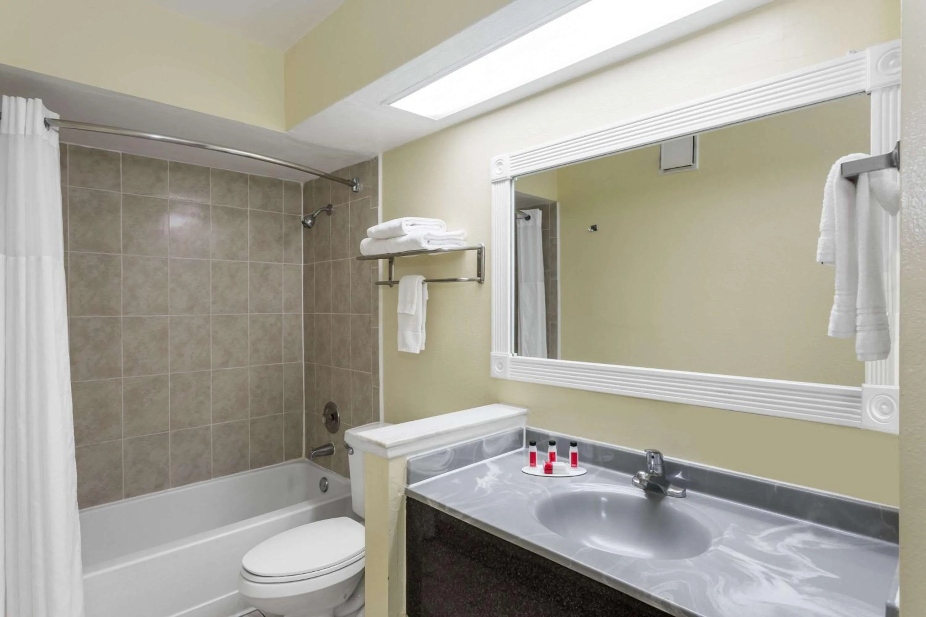 Bathroom in Days Inn & Suites by Wyndham Port Richey