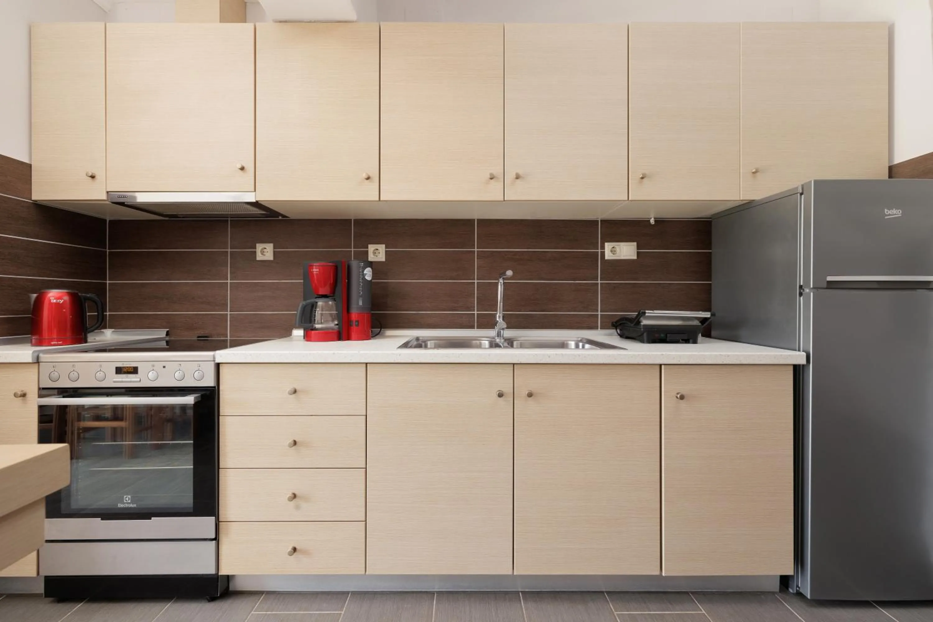 Coffee/tea facilities in Santos Luxury Apartments