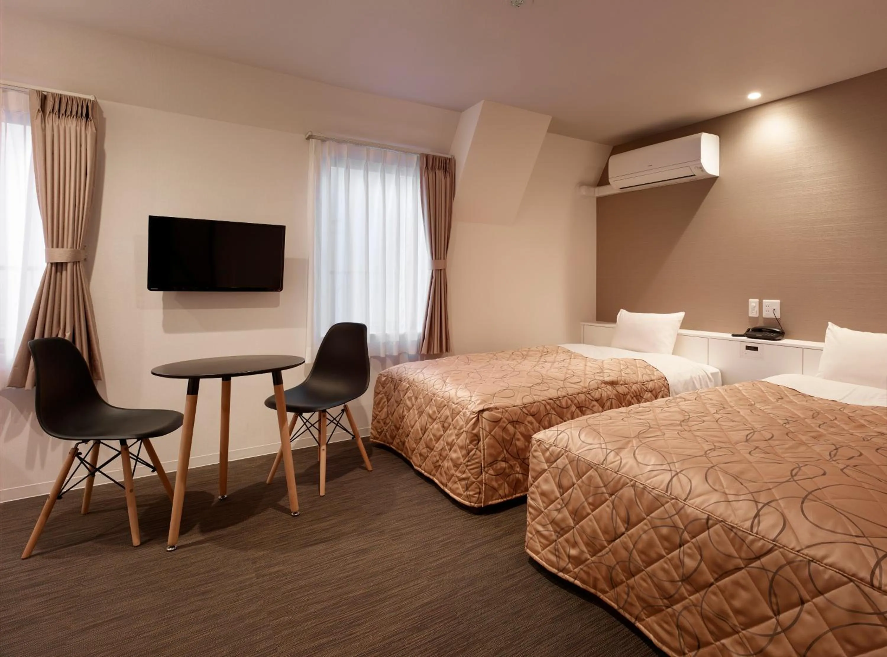 Bed in Hotel New Tohoku