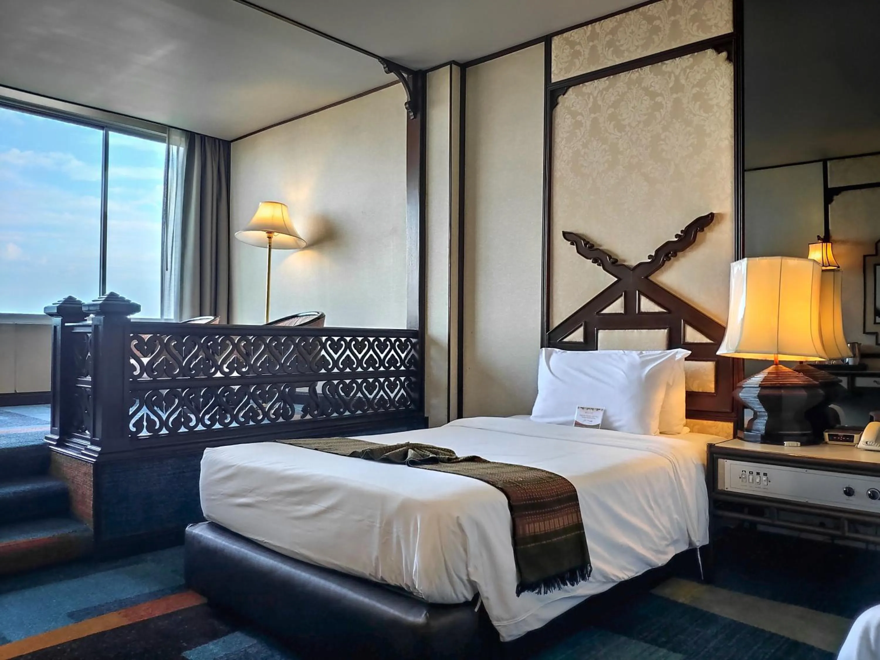 Bed in Chiang Mai Orchid Hotel