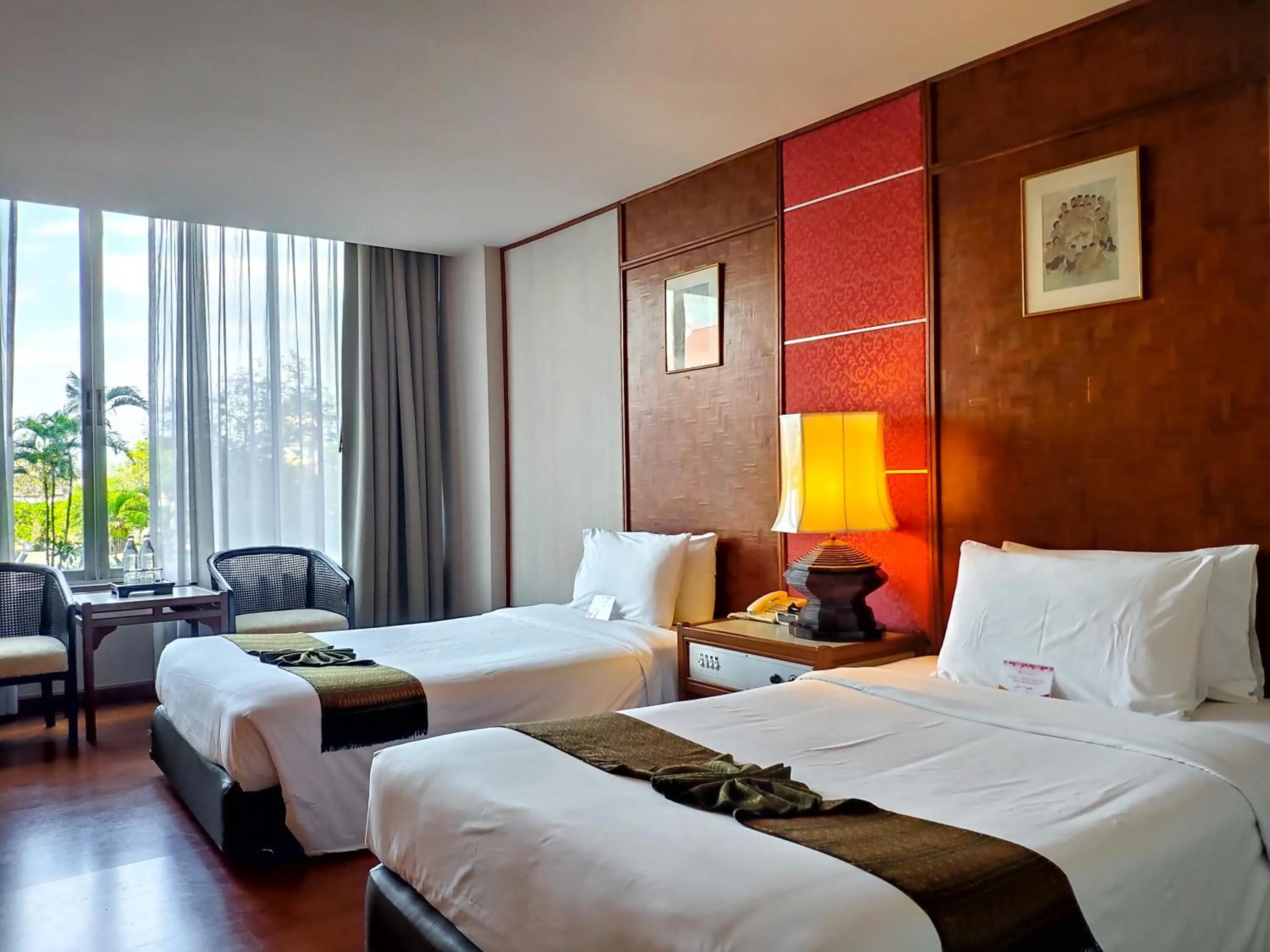 Bed in Chiang Mai Orchid Hotel