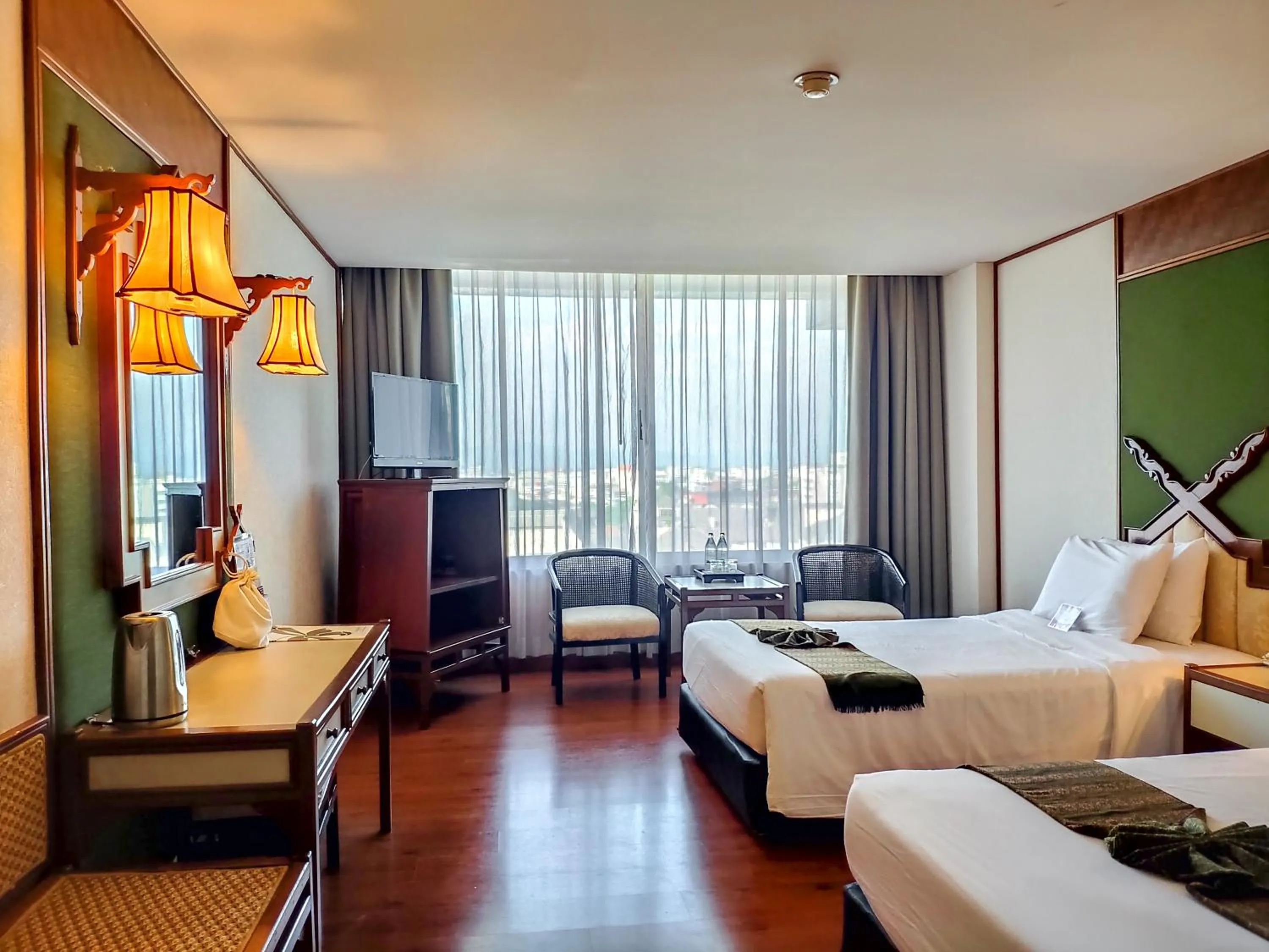 Photo of the whole room, Bed in Chiang Mai Orchid Hotel