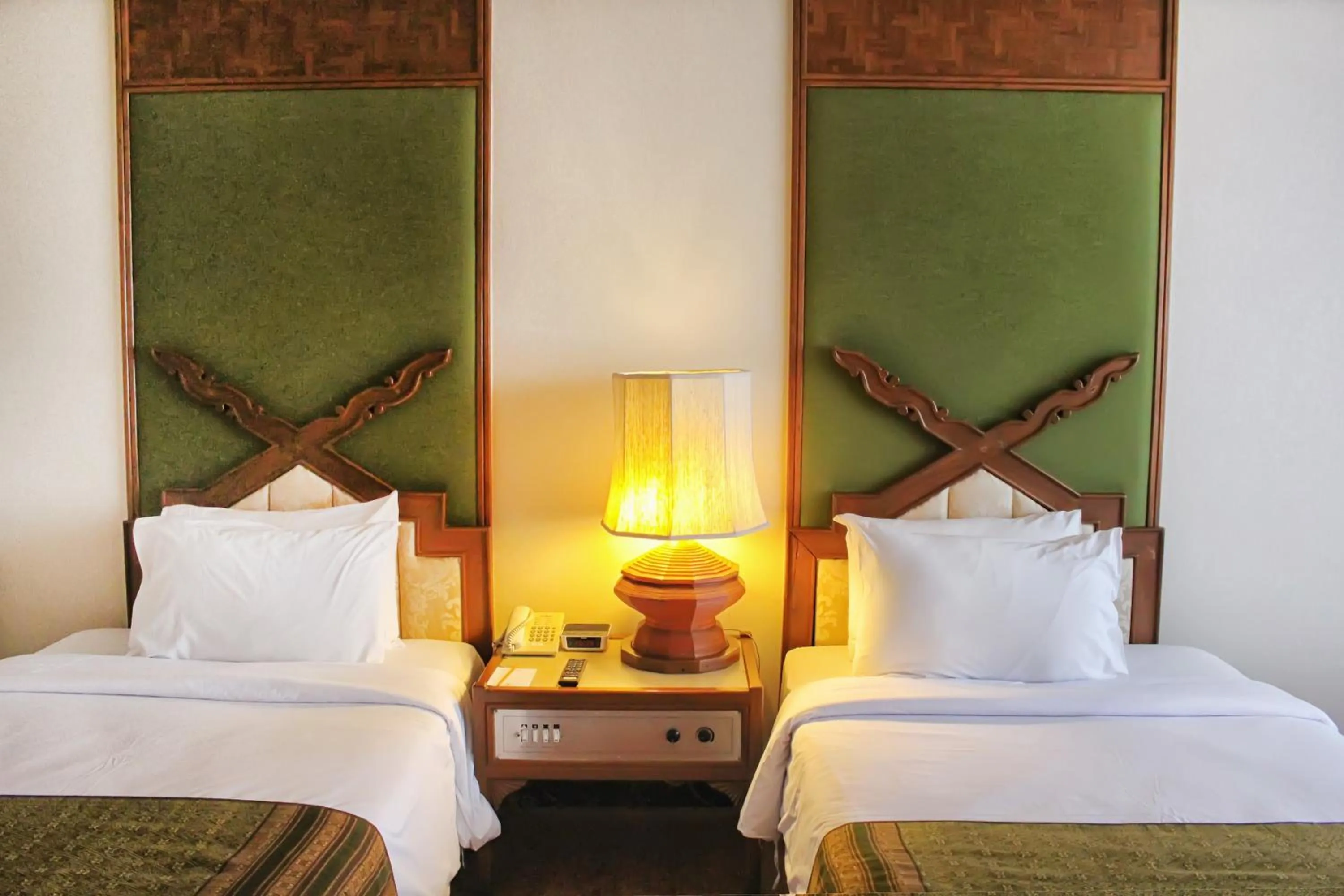 Bed in Chiang Mai Orchid Hotel