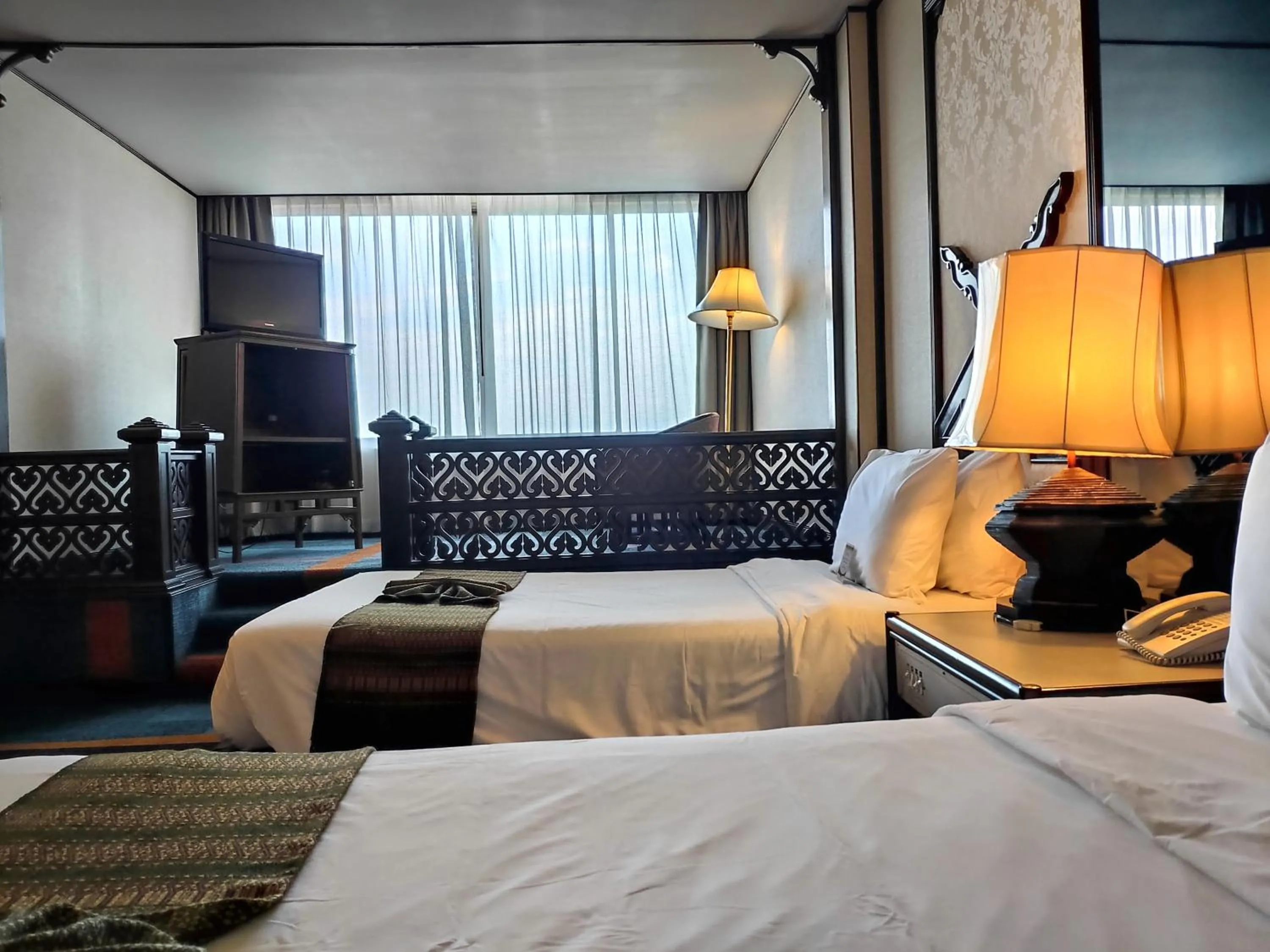 Bed in Chiang Mai Orchid Hotel