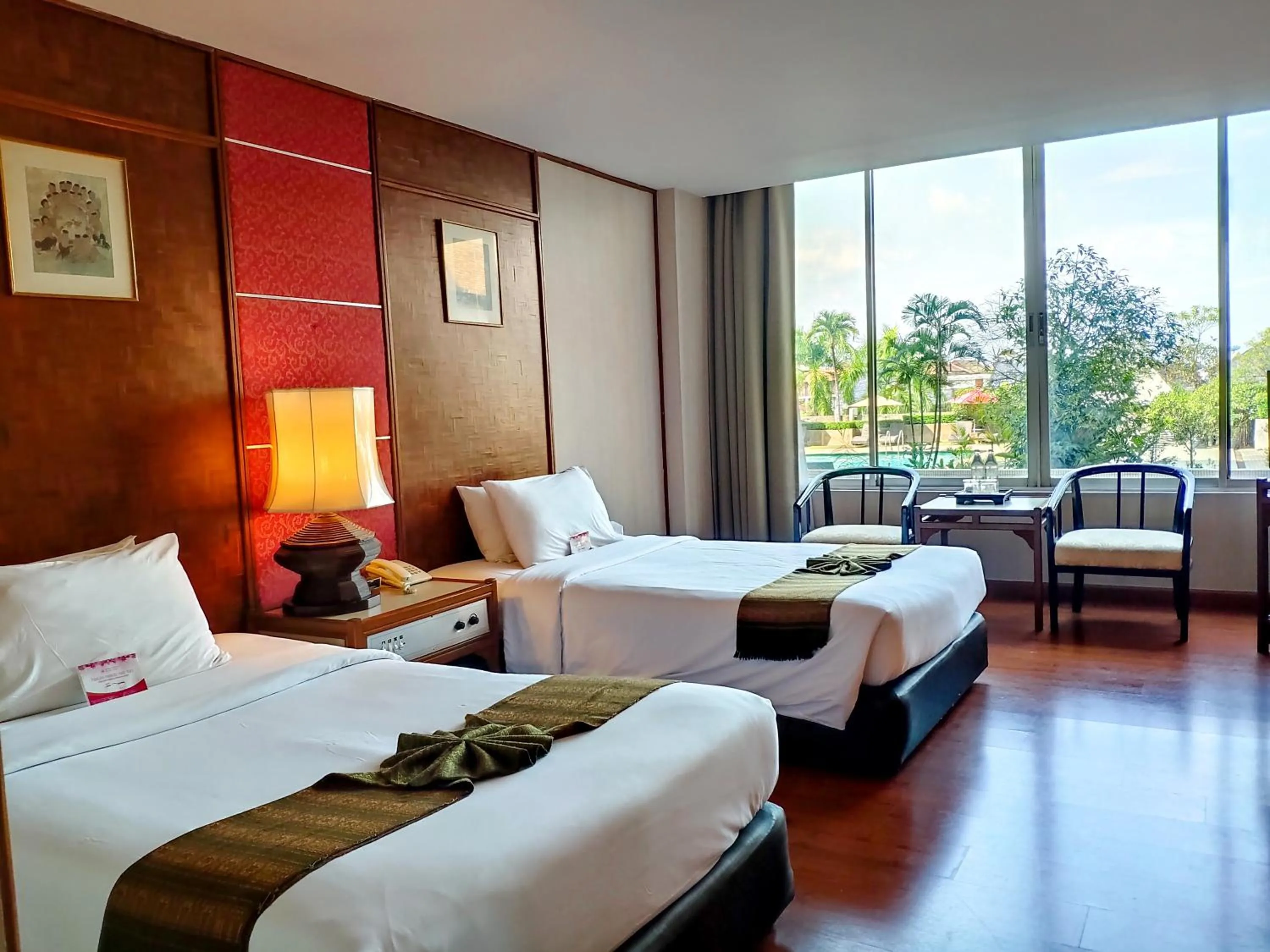 Bed in Chiang Mai Orchid Hotel