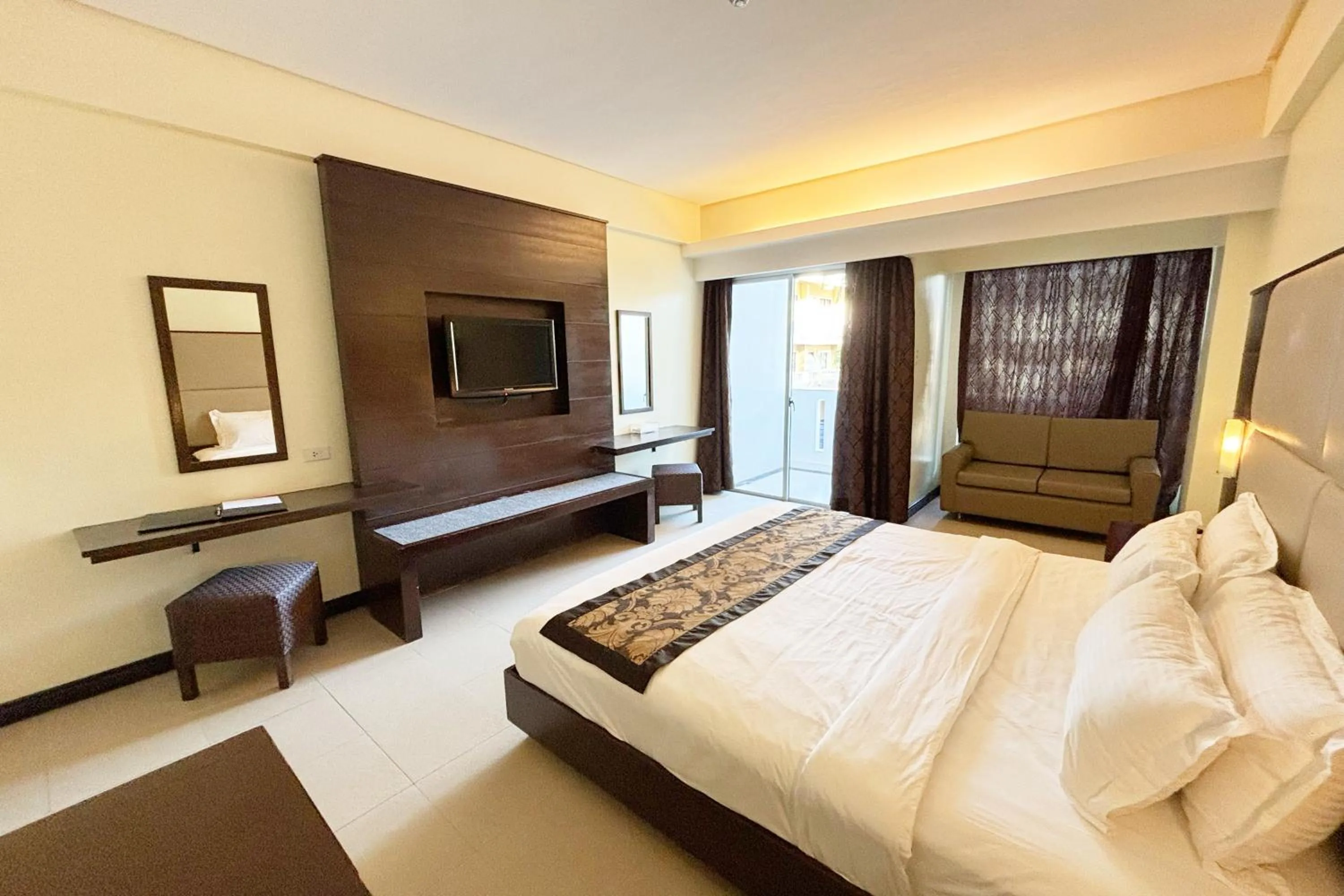 Bed in The Muse Beach Front Hotel Boracay