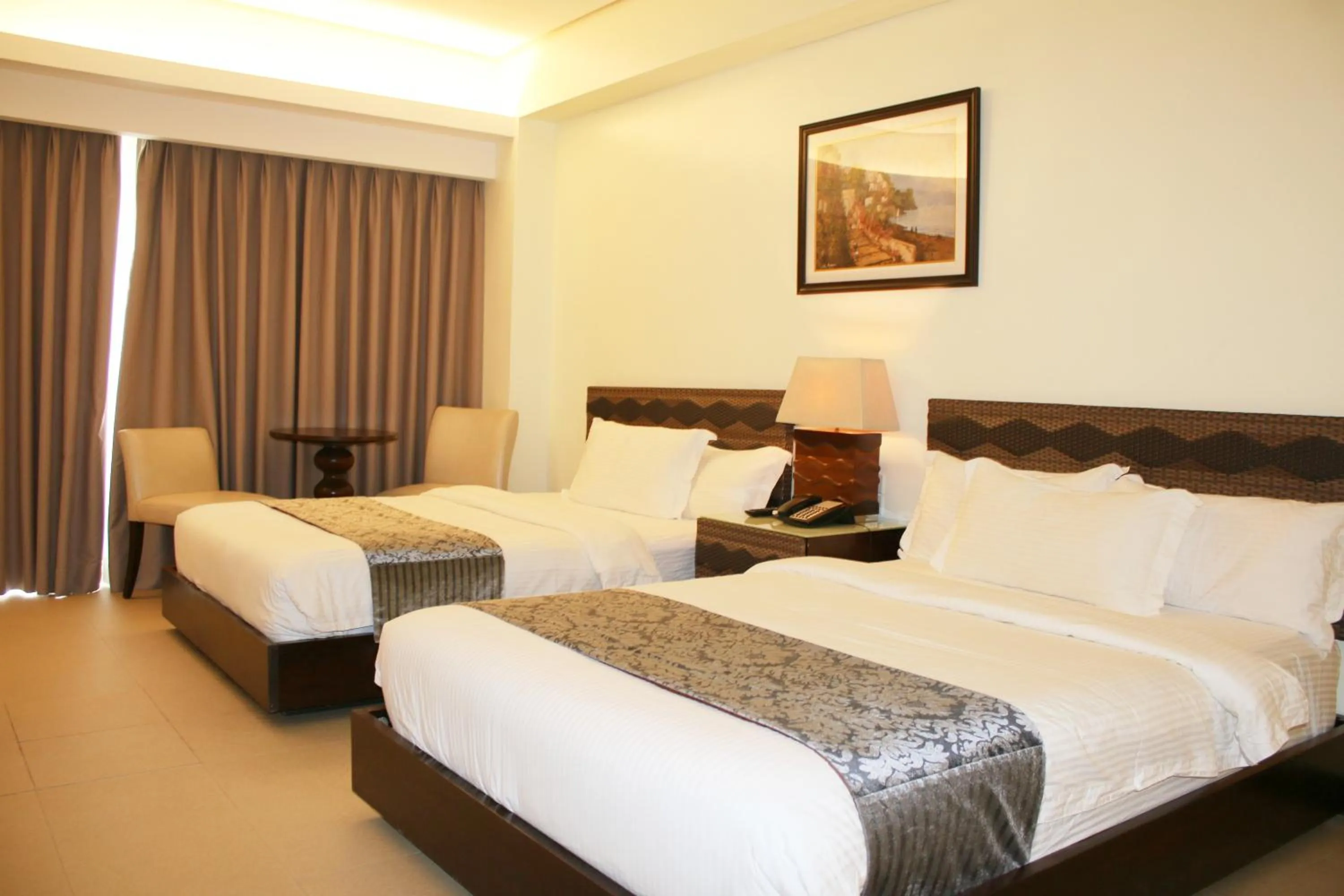 Bed in The Muse Beach Front Hotel Boracay