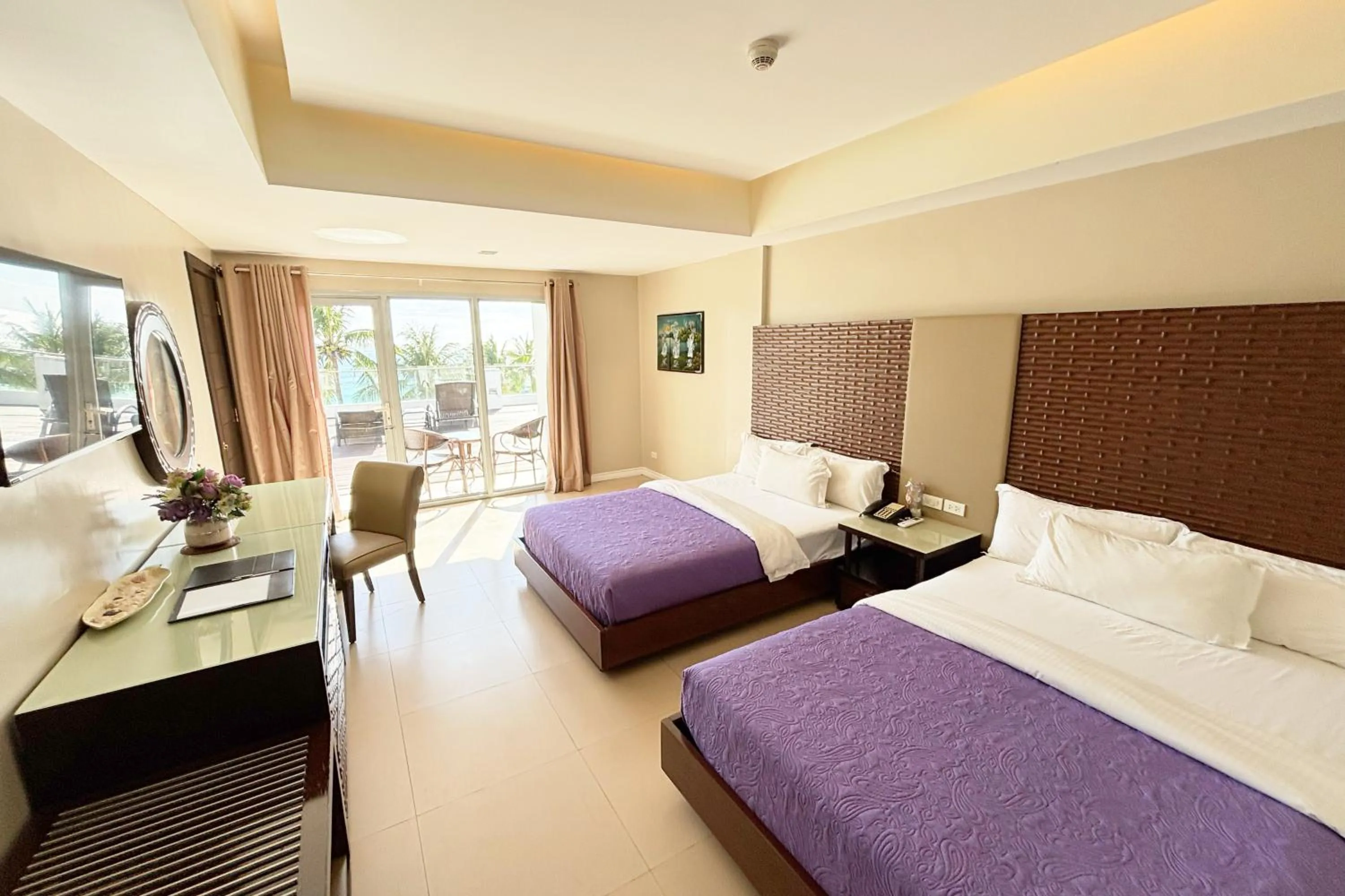 Bed in The Muse Beach Front Hotel Boracay