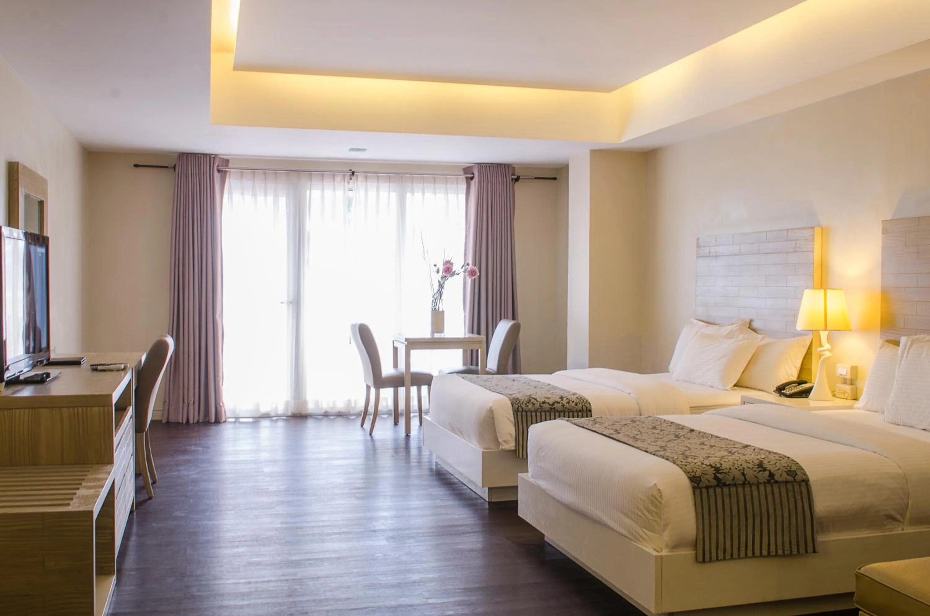 Photo of the whole room, Bed in The Muse Beach Front Hotel Boracay