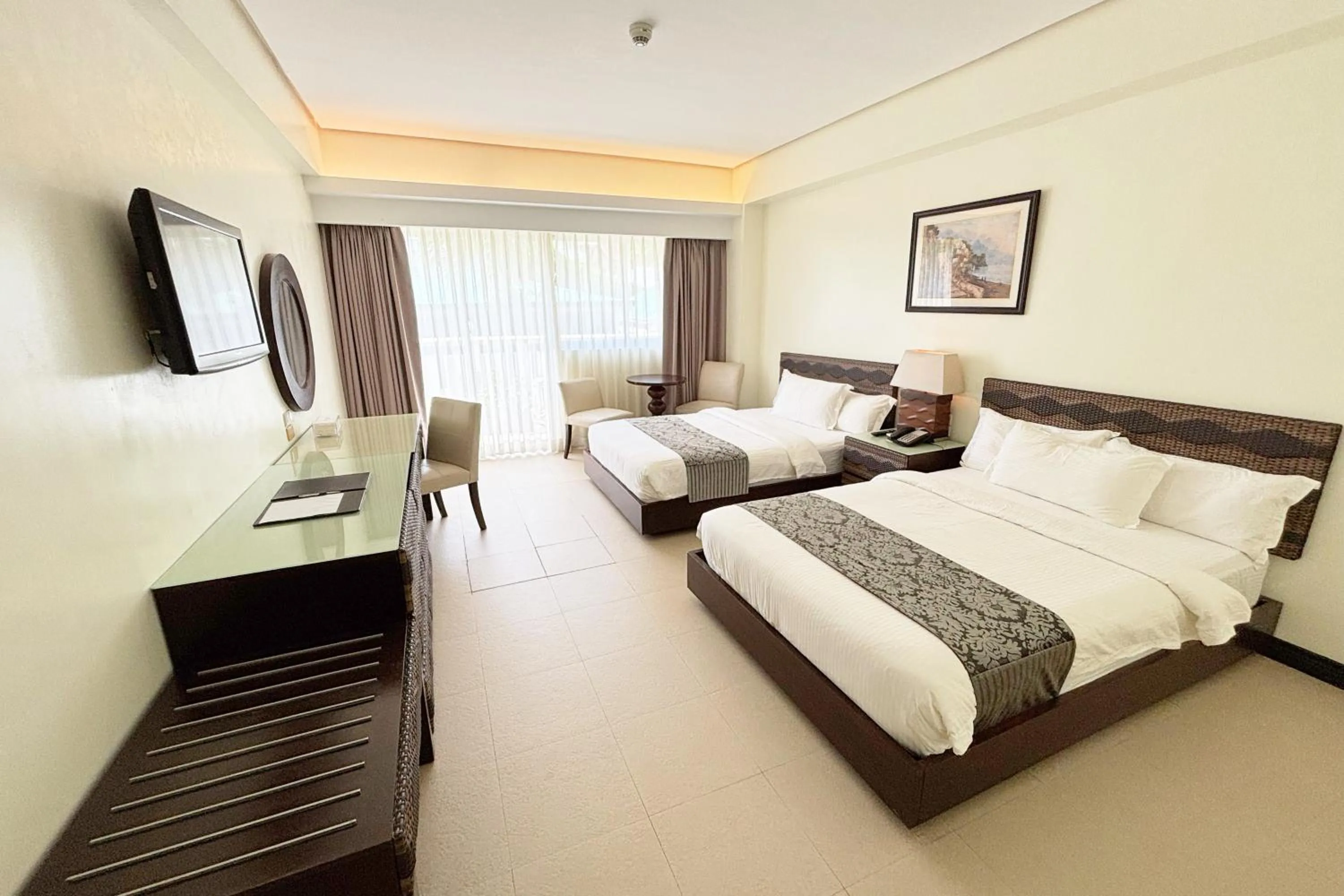 Bed in The Muse Beach Front Hotel Boracay