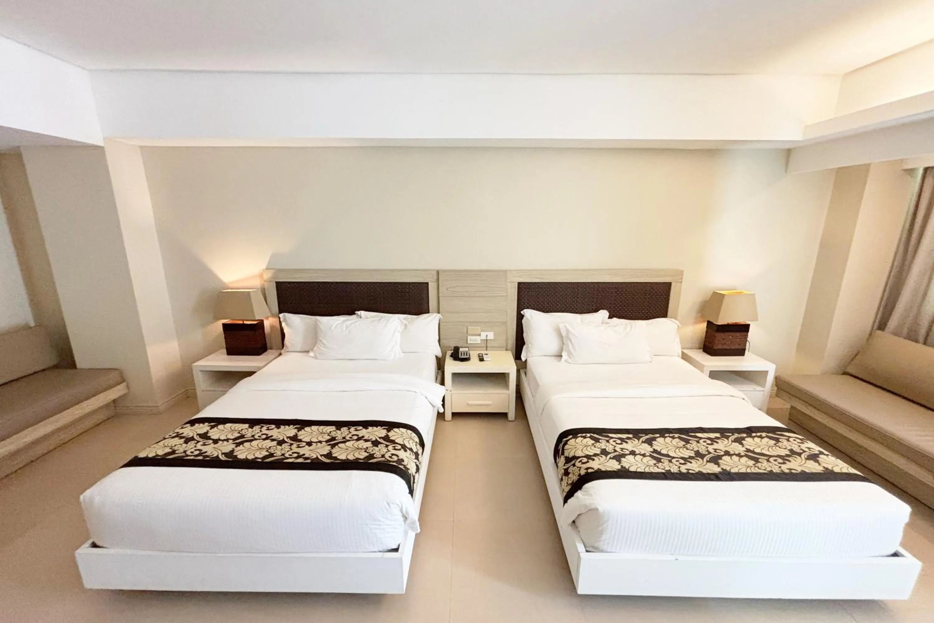 Bed in The Muse Beach Front Hotel Boracay