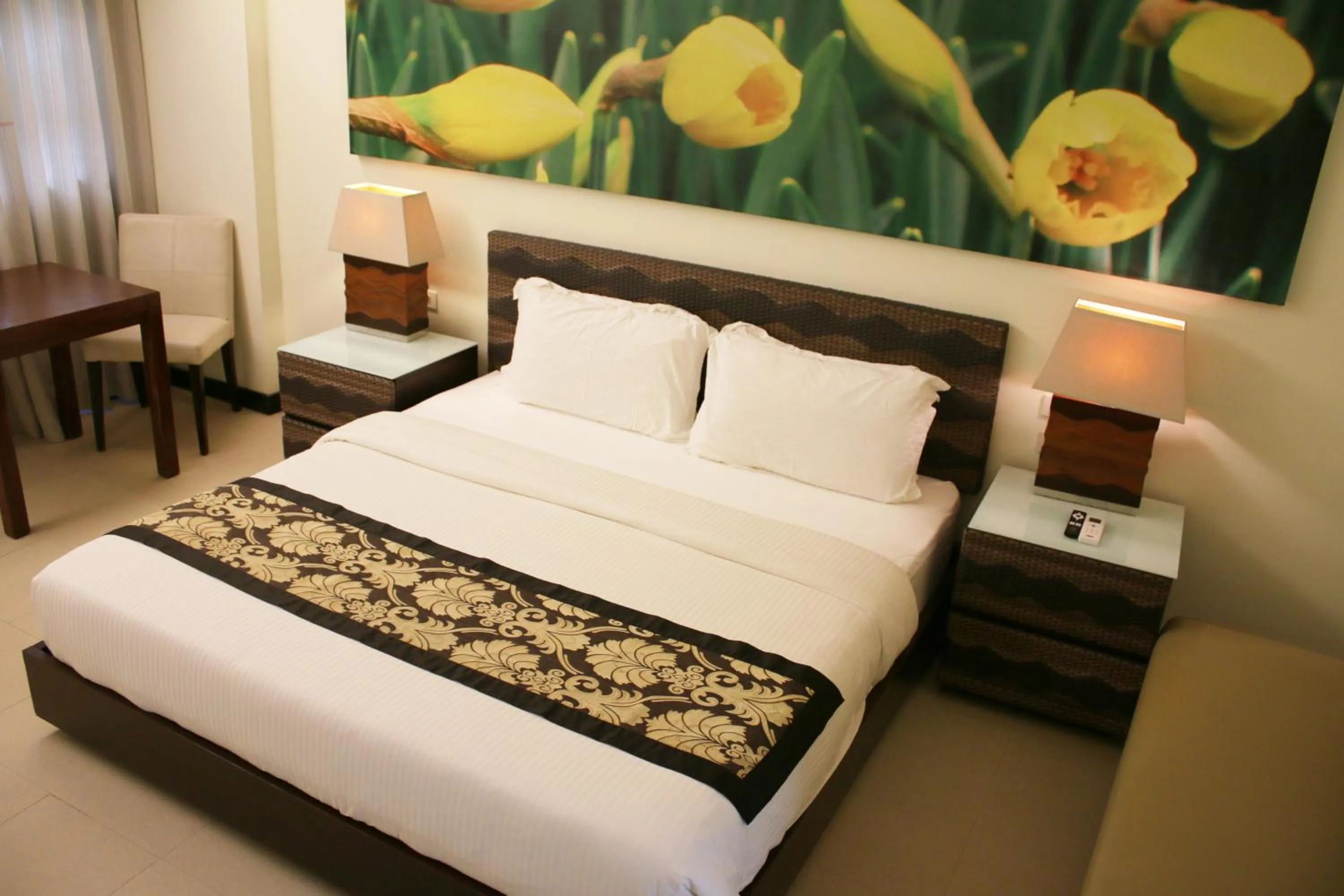 Bed in The Muse Beach Front Hotel Boracay