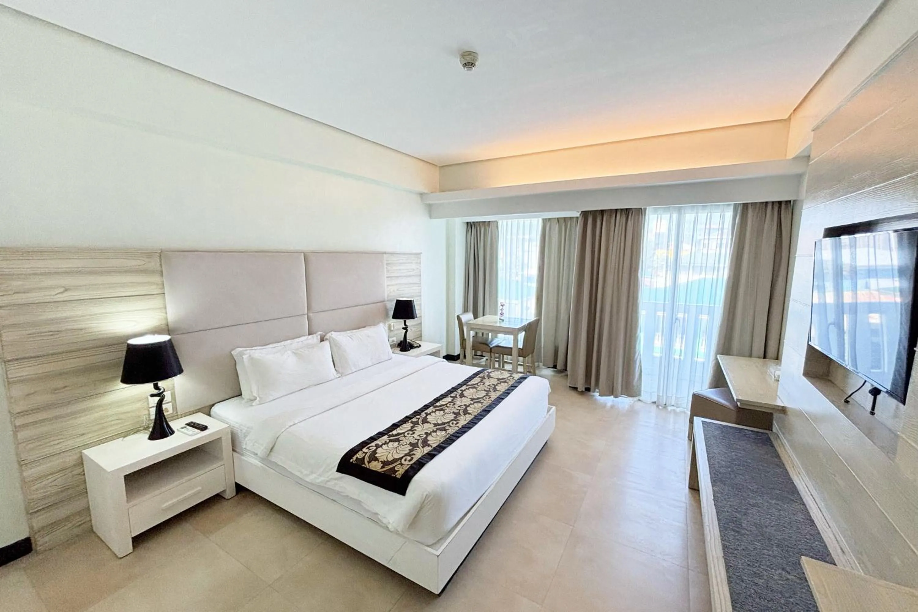 Bed in The Muse Beach Front Hotel Boracay