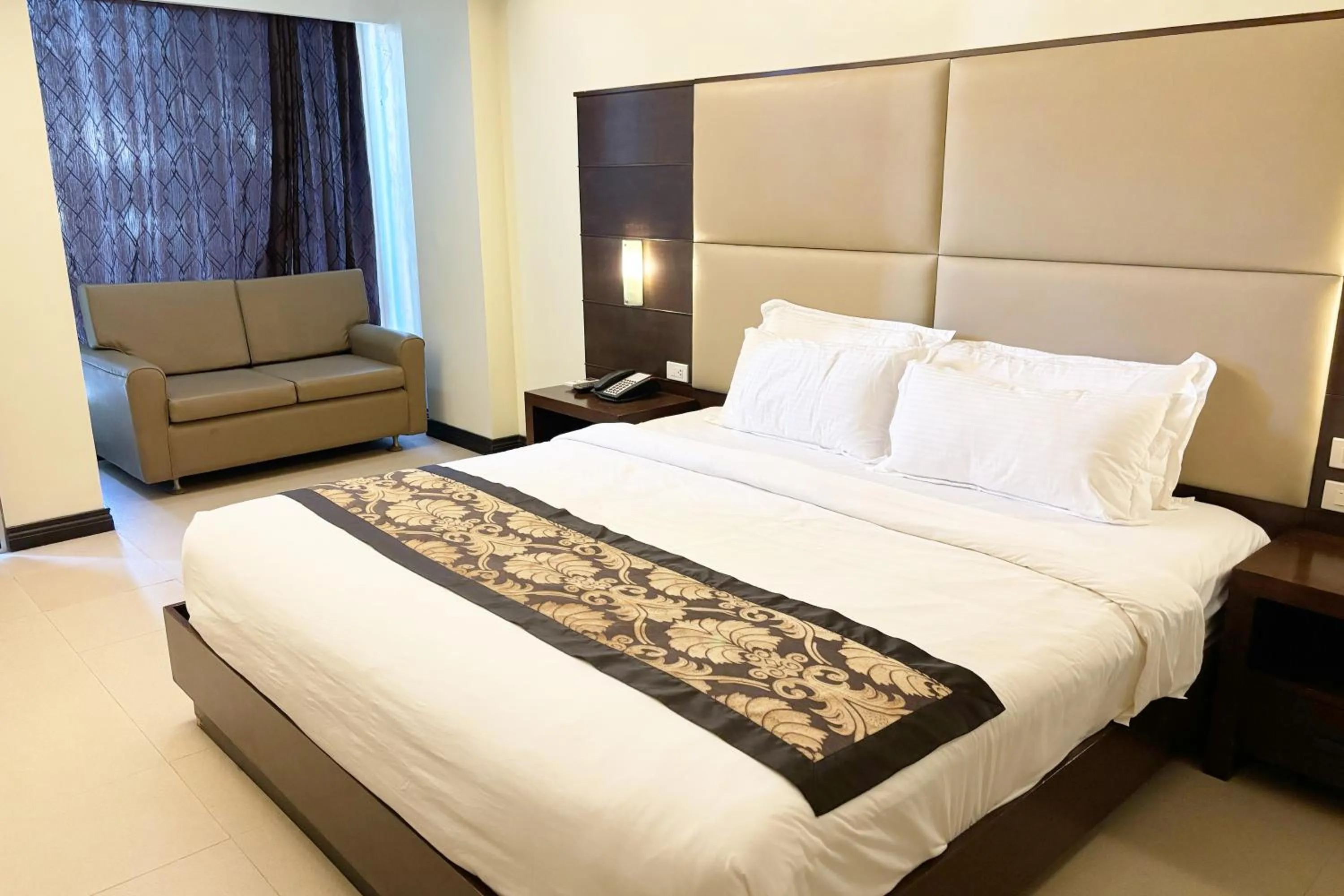 Bed in The Muse Beach Front Hotel Boracay