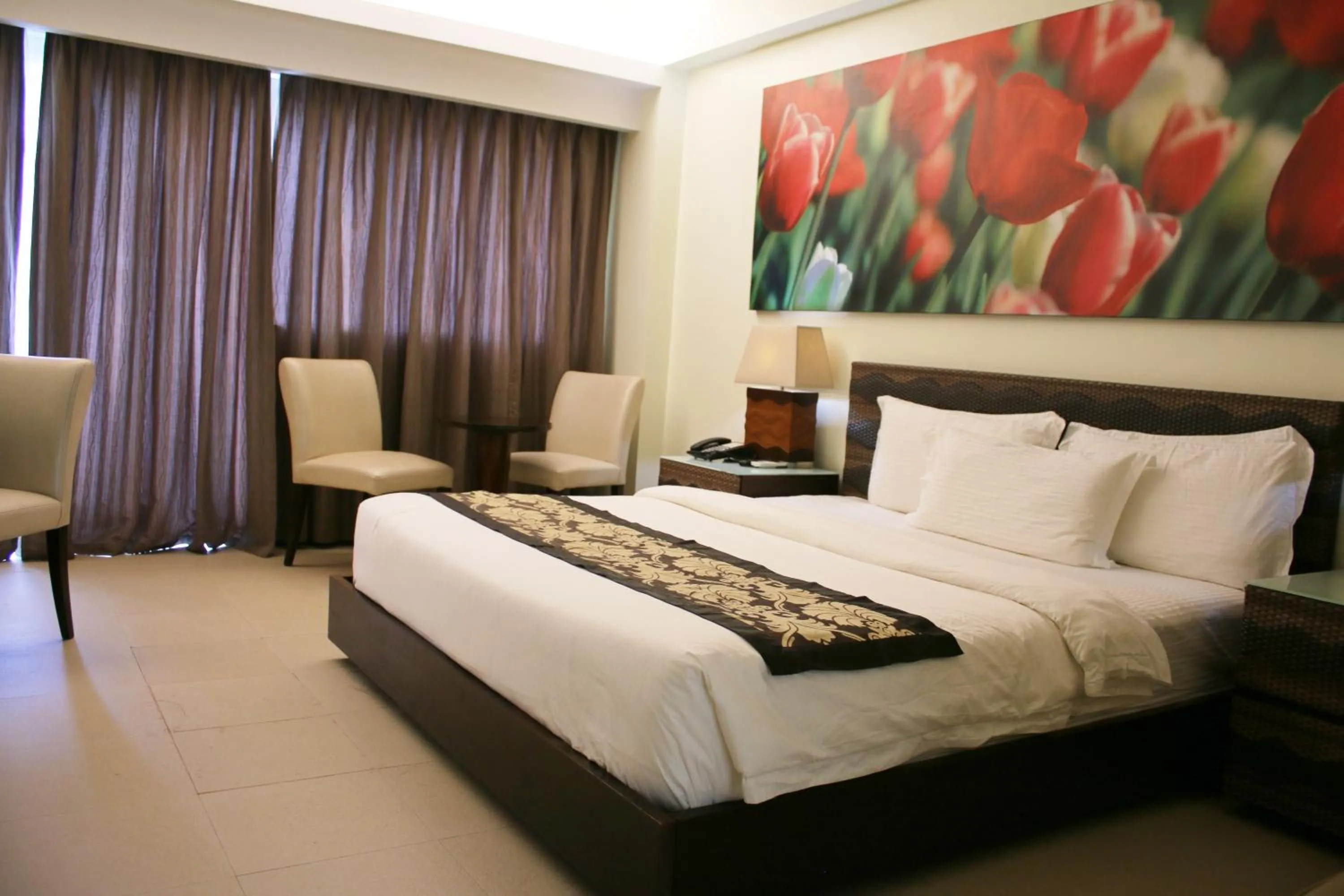 Bed in The Muse Beach Front Hotel Boracay