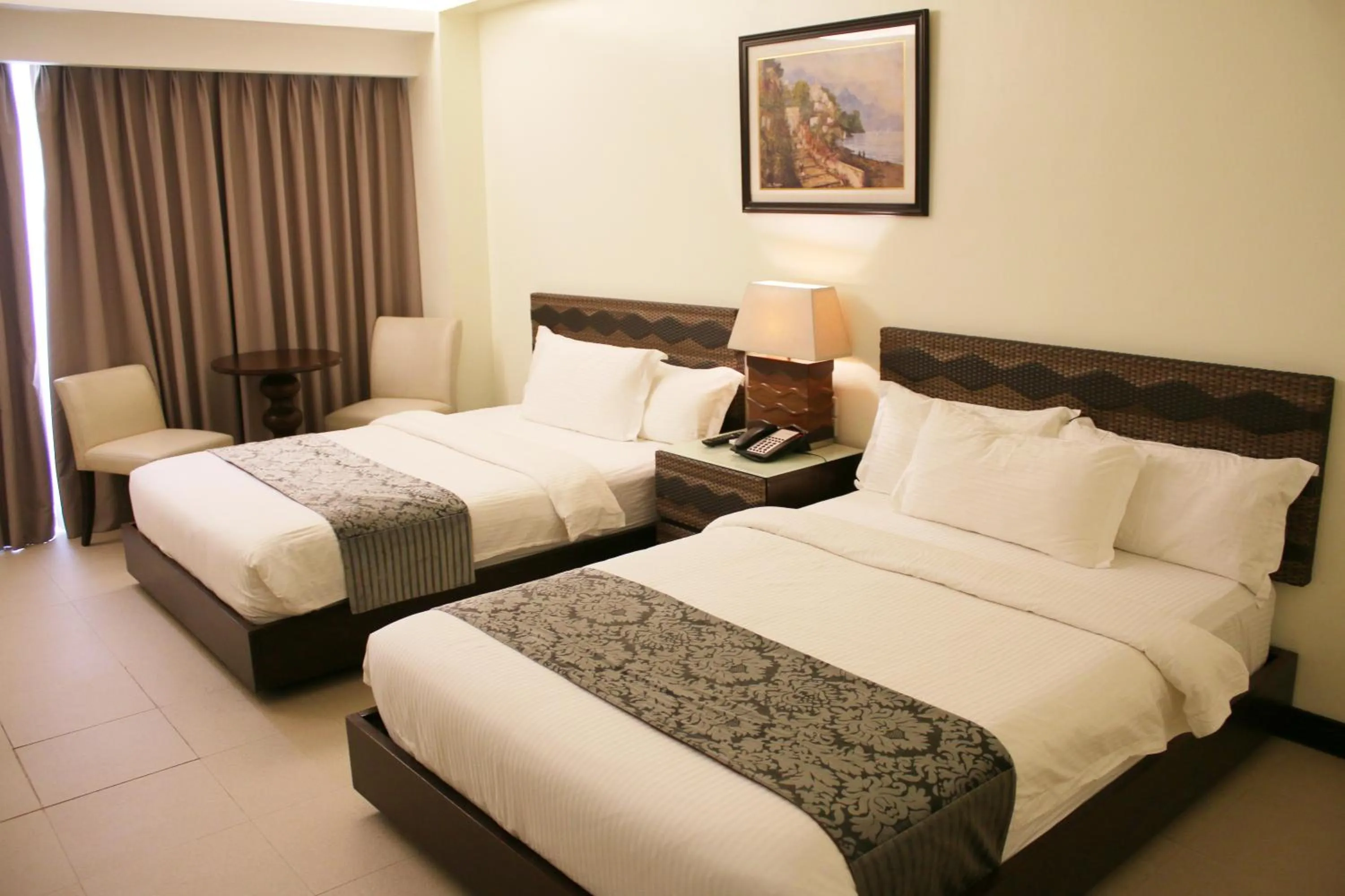 Bed in The Muse Beach Front Hotel Boracay