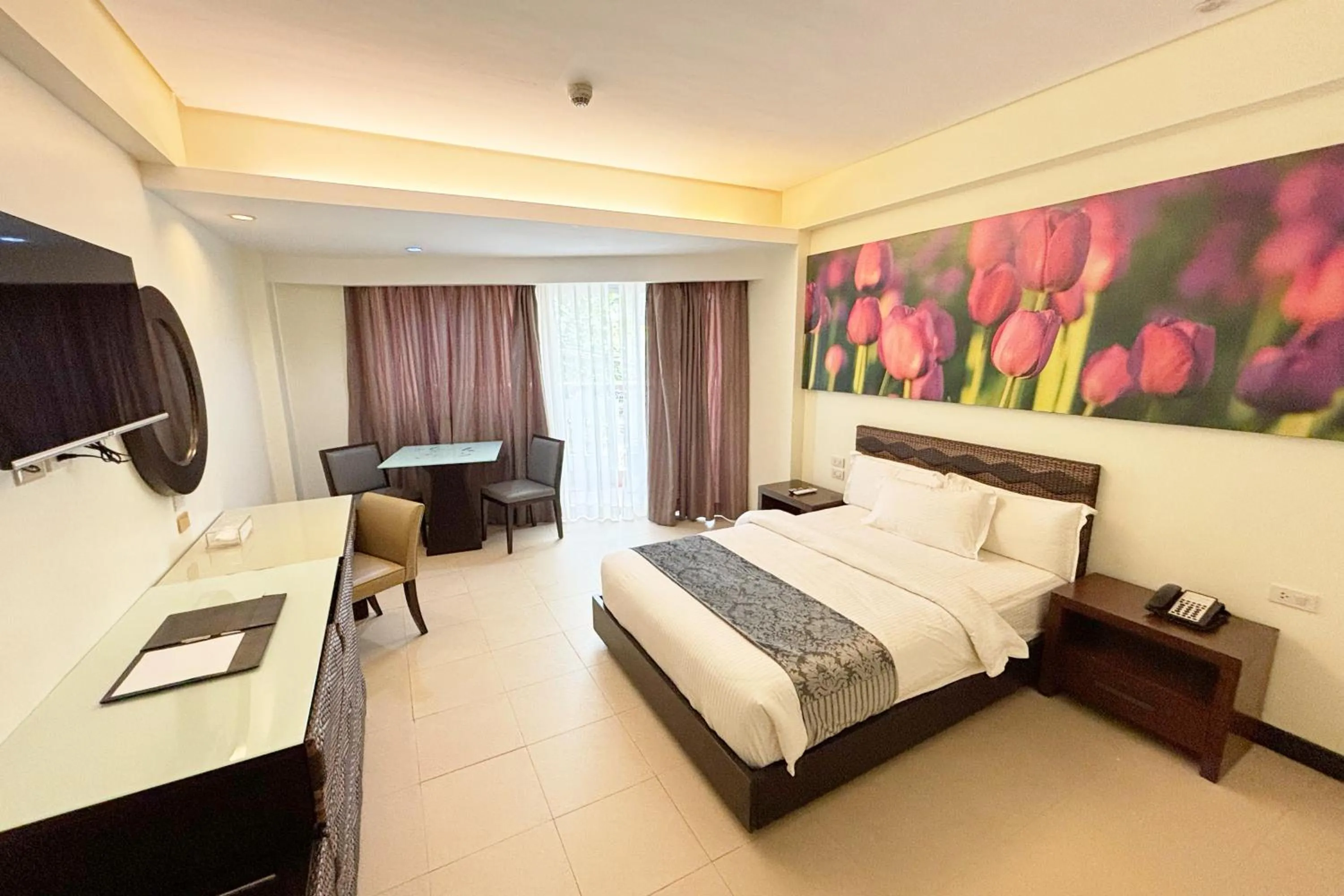 Bed in The Muse Beach Front Hotel Boracay