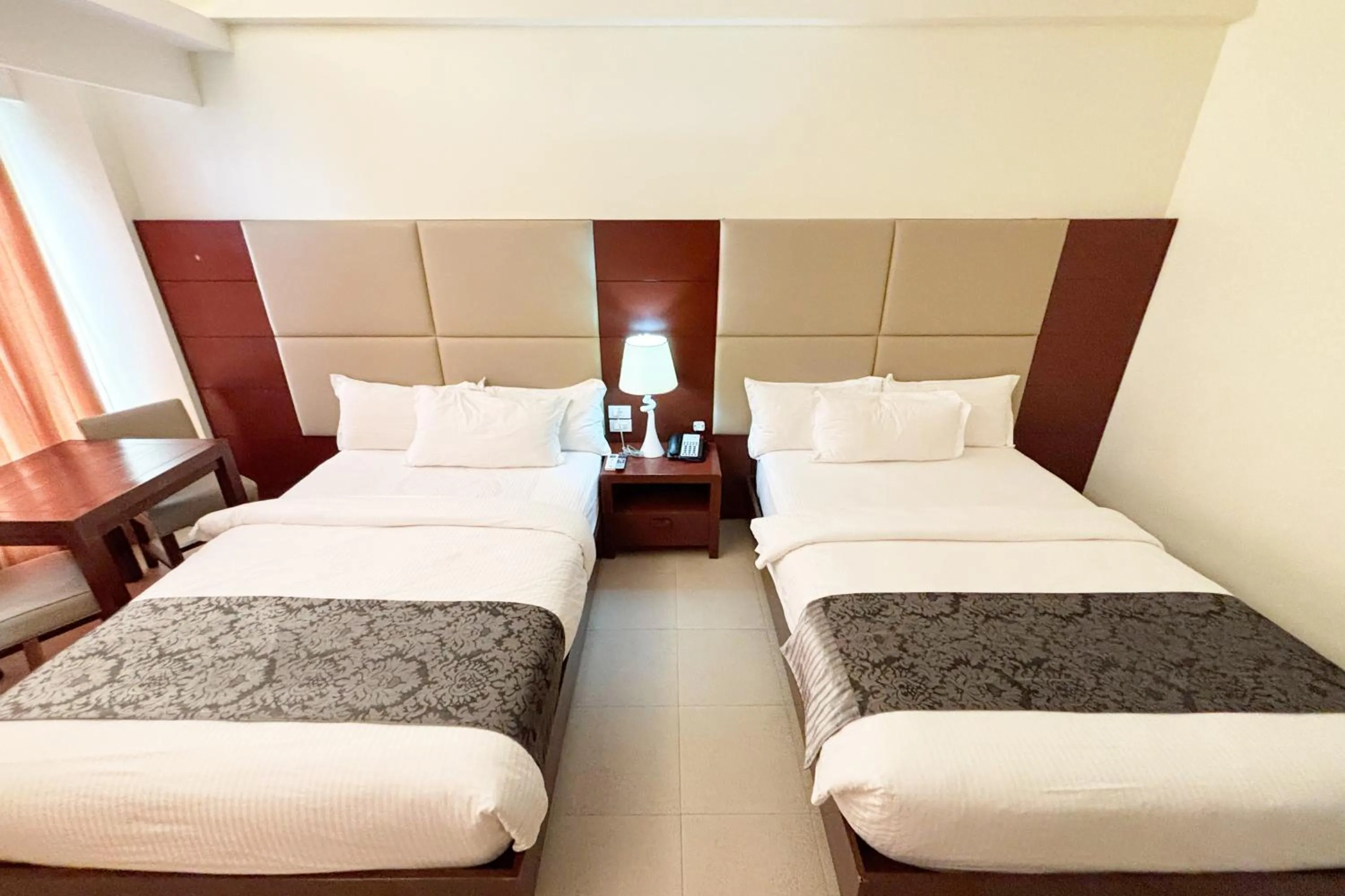 Bed in The Muse Beach Front Hotel Boracay