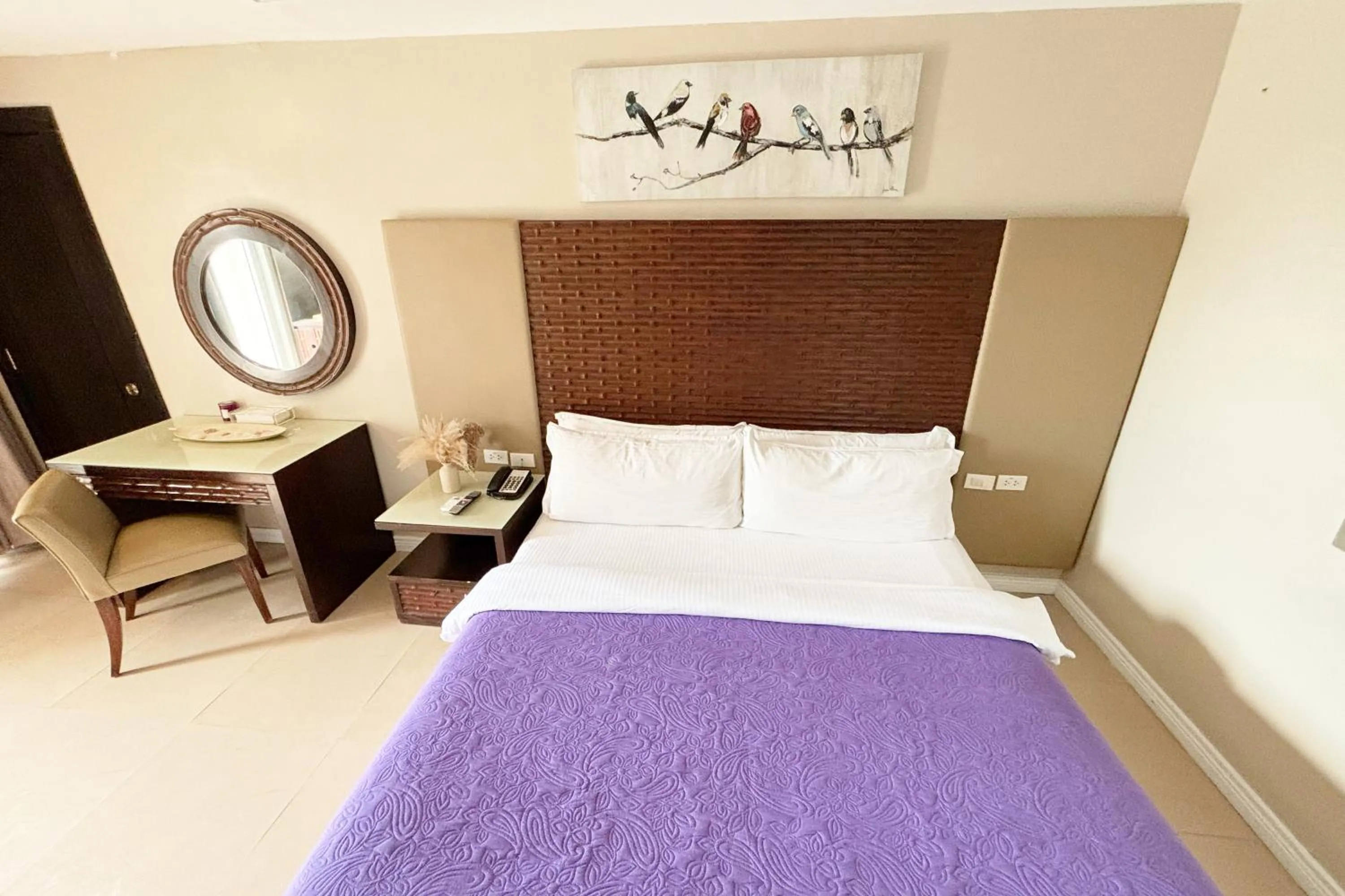 Bed in The Muse Beach Front Hotel Boracay