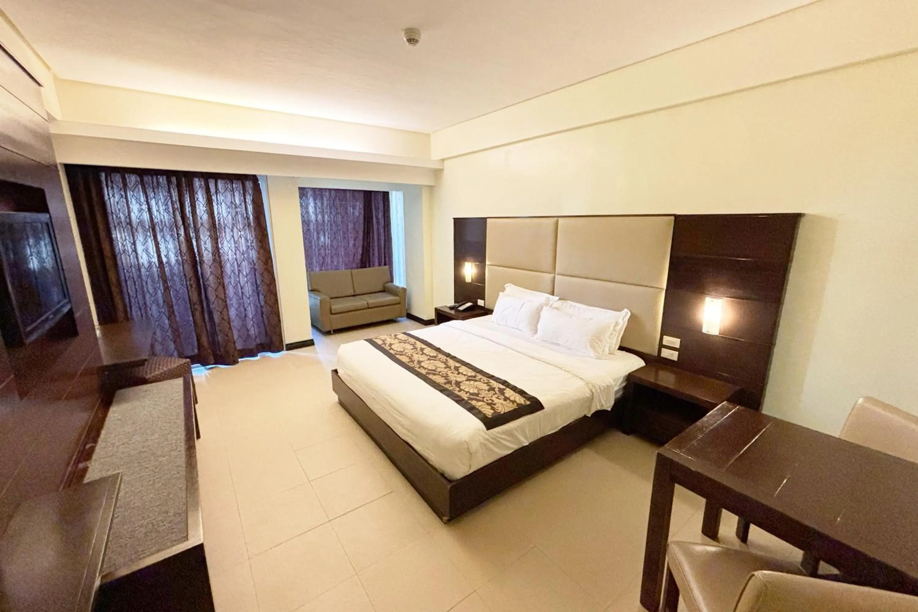 Bed in The Muse Beach Front Hotel Boracay