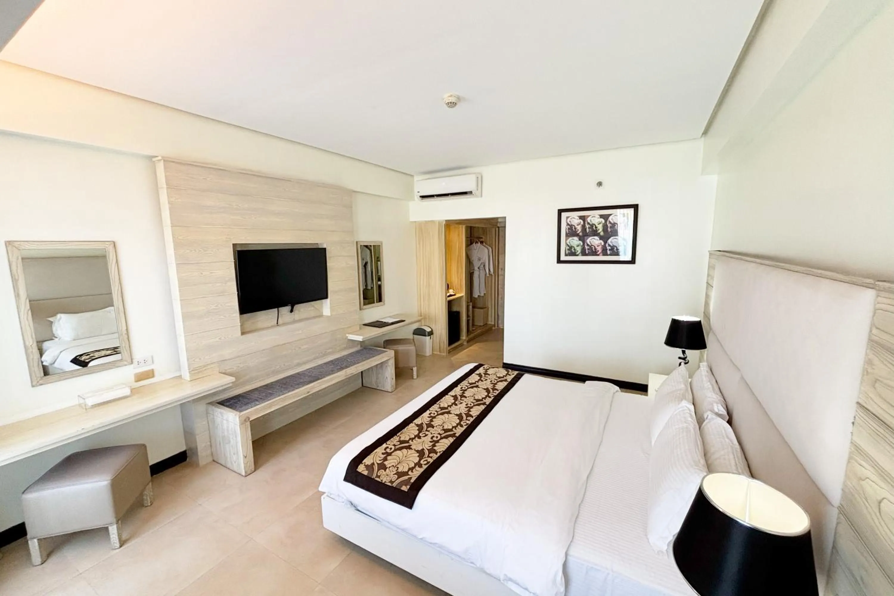 Bed in The Muse Beach Front Hotel Boracay