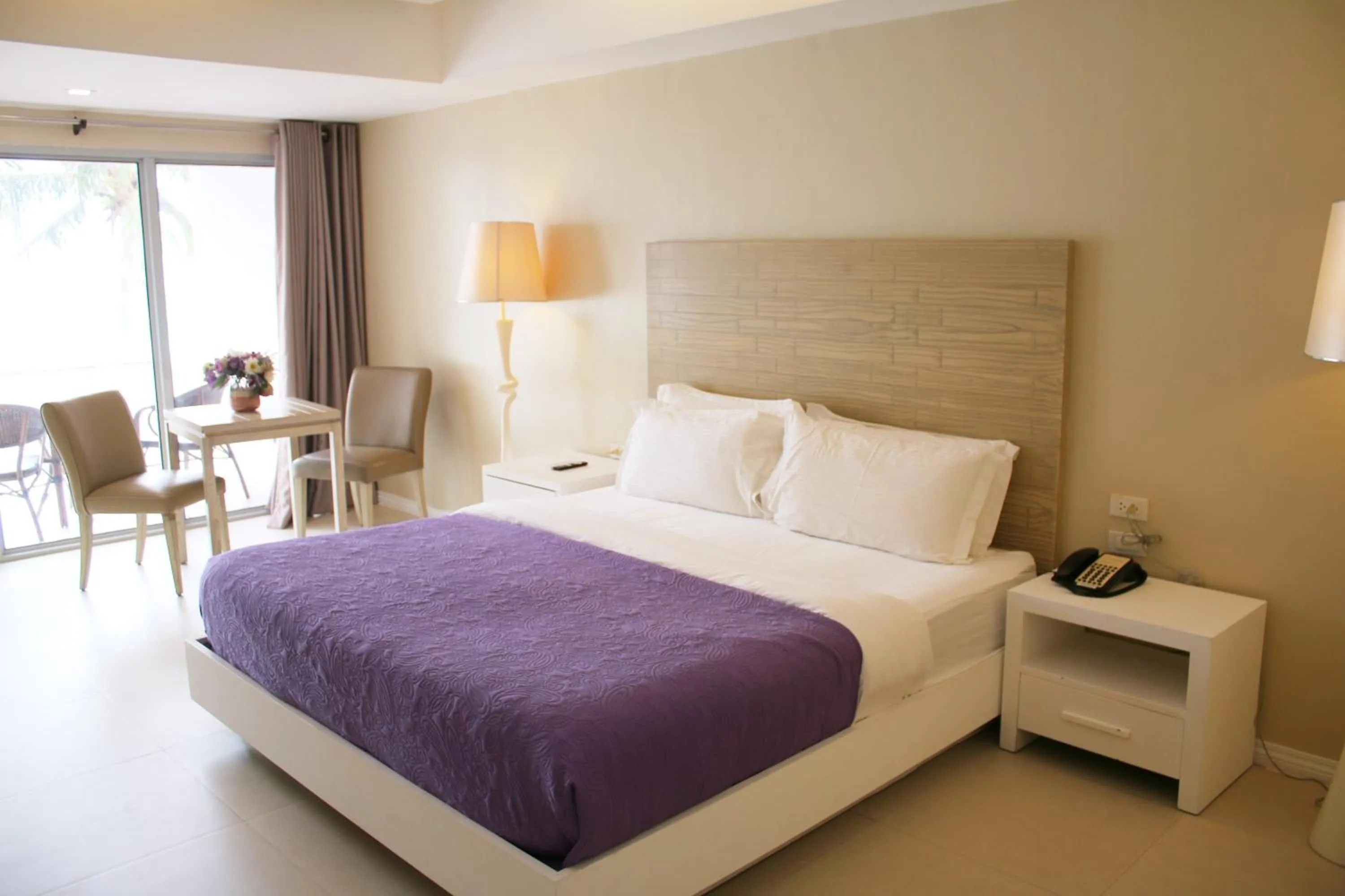 Bed in The Muse Beach Front Hotel Boracay