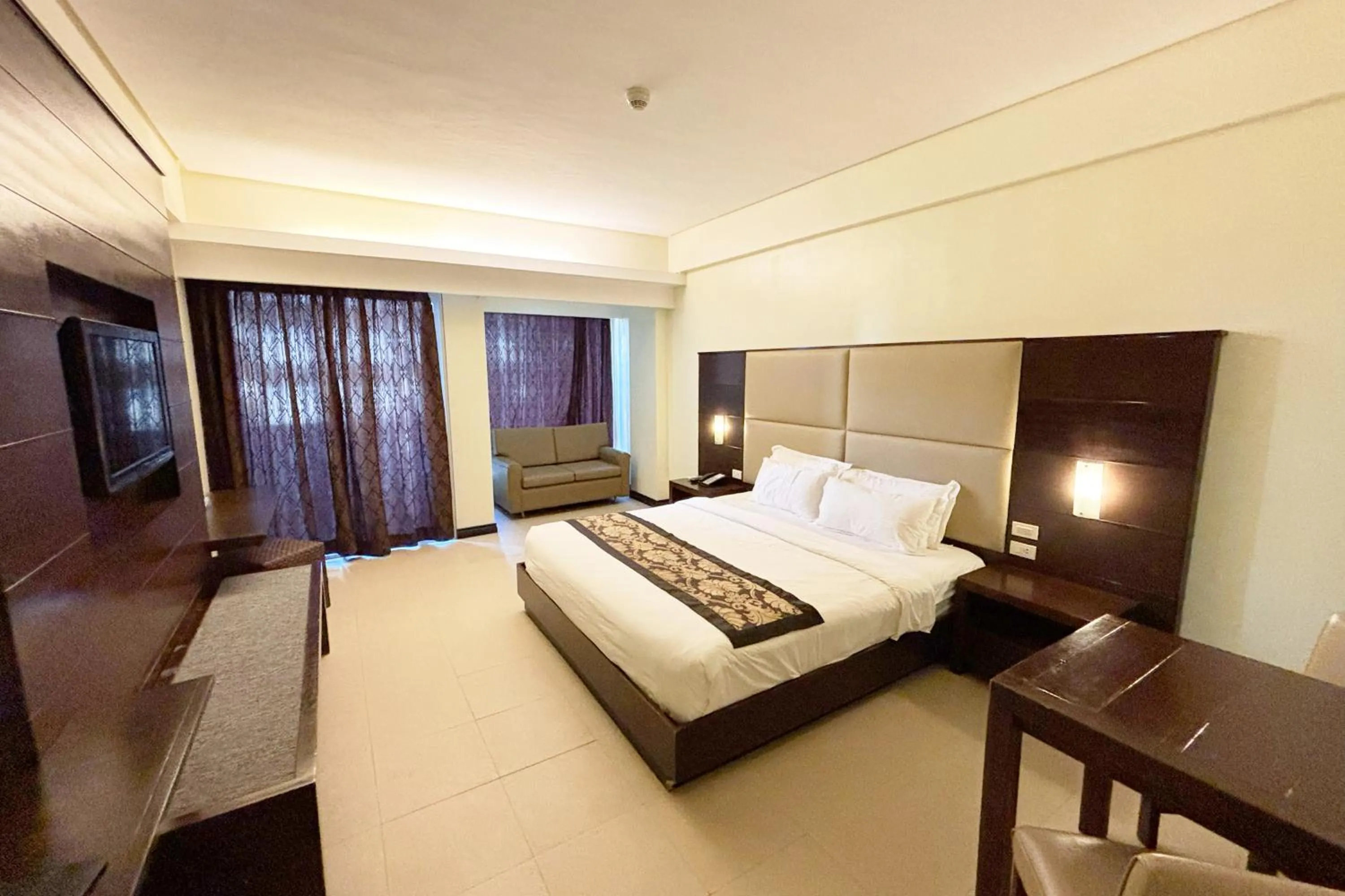 Bed in The Muse Beach Front Hotel Boracay