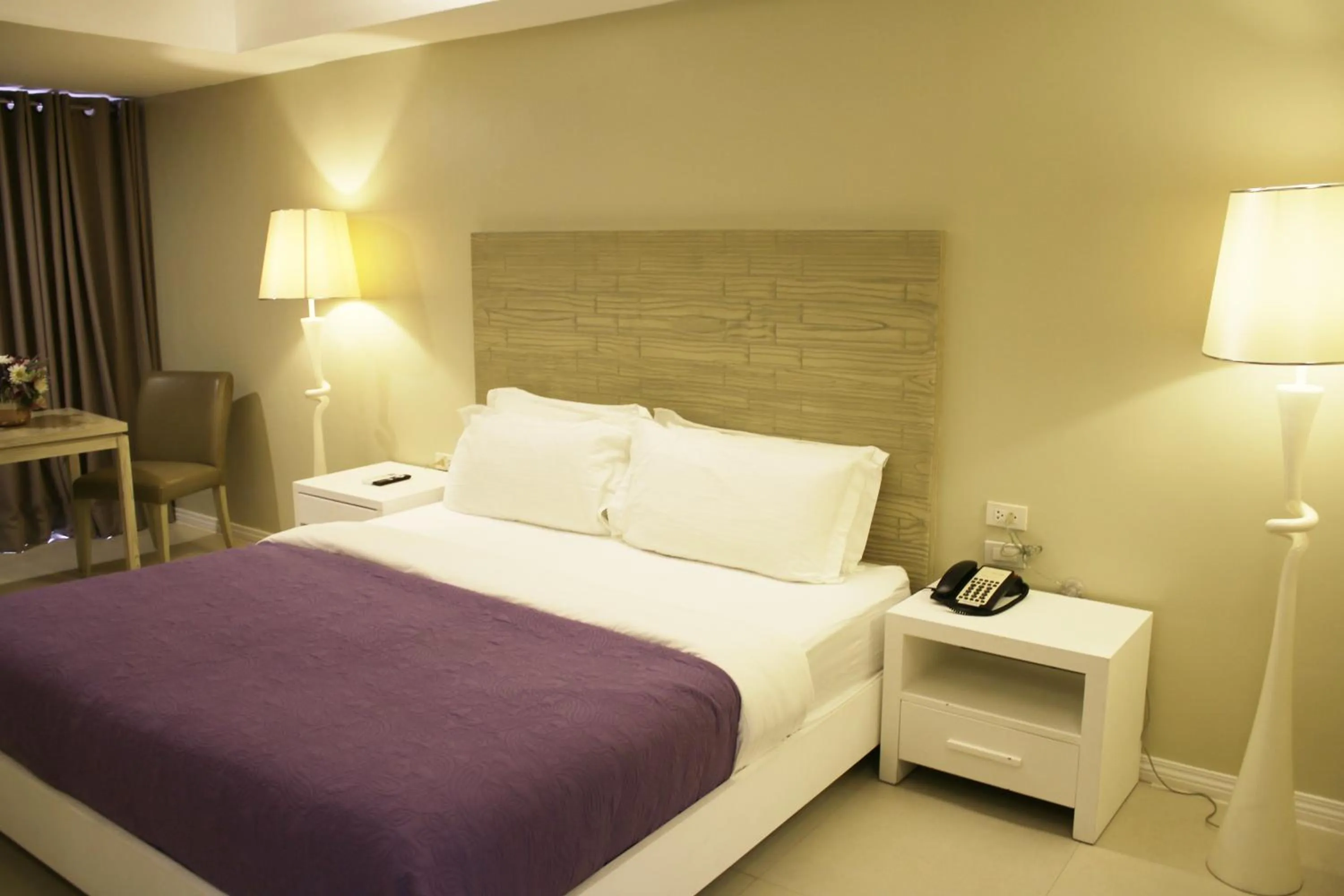 Bed in The Muse Beach Front Hotel Boracay