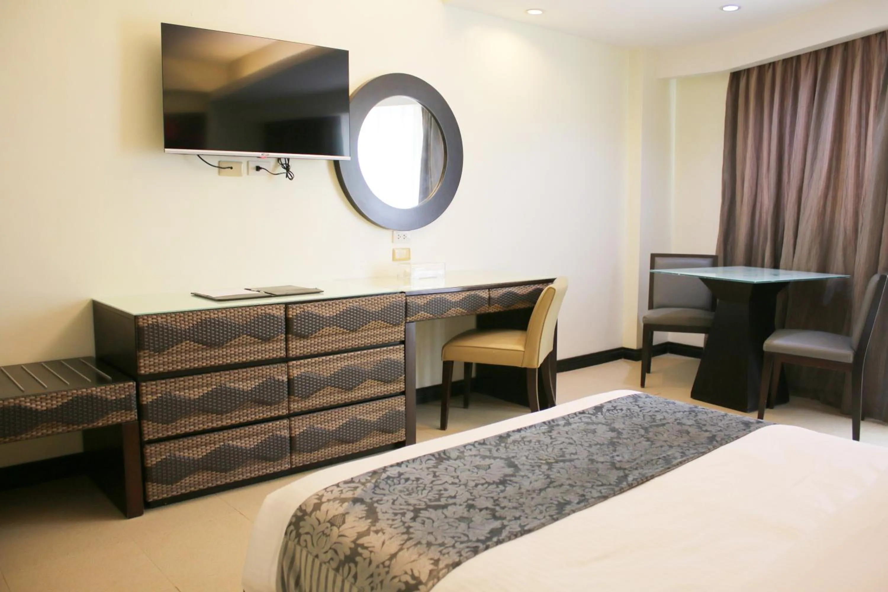 Bed in The Muse Beach Front Hotel Boracay