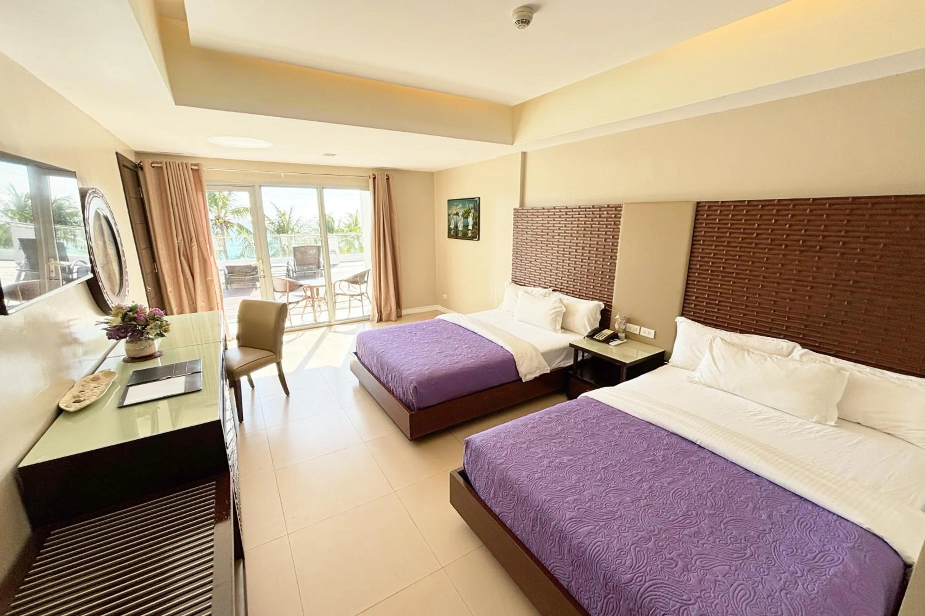 Bed in The Muse Beach Front Hotel Boracay