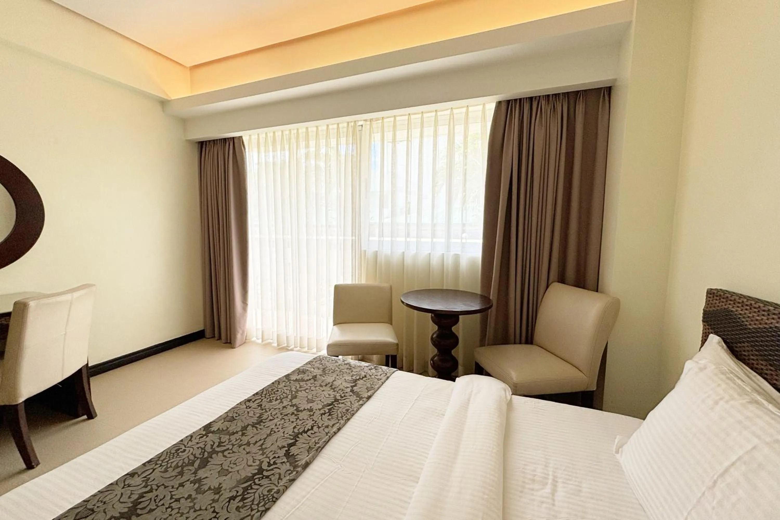 Bed in The Muse Beach Front Hotel Boracay