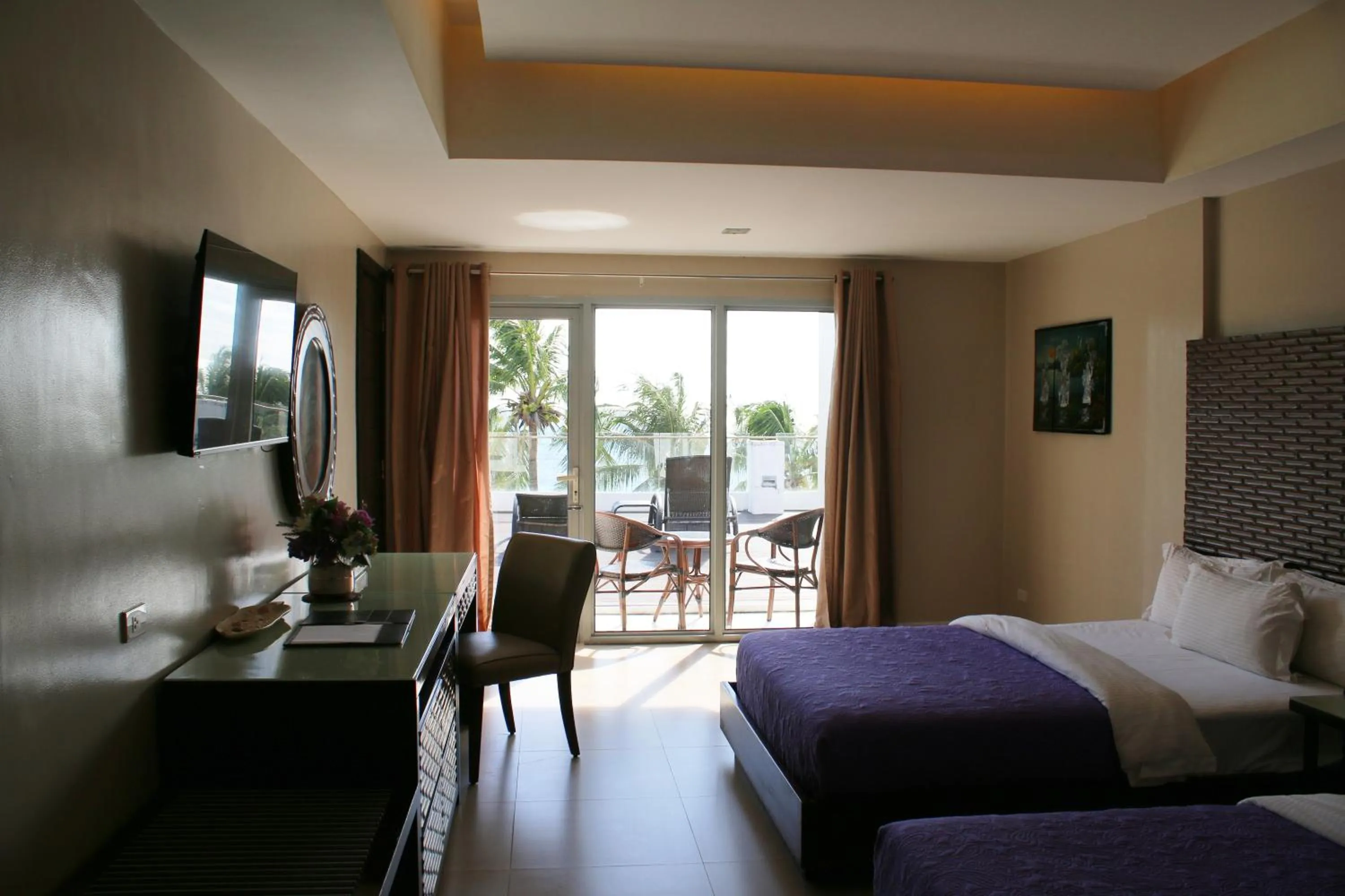 Bed in The Muse Beach Front Hotel Boracay