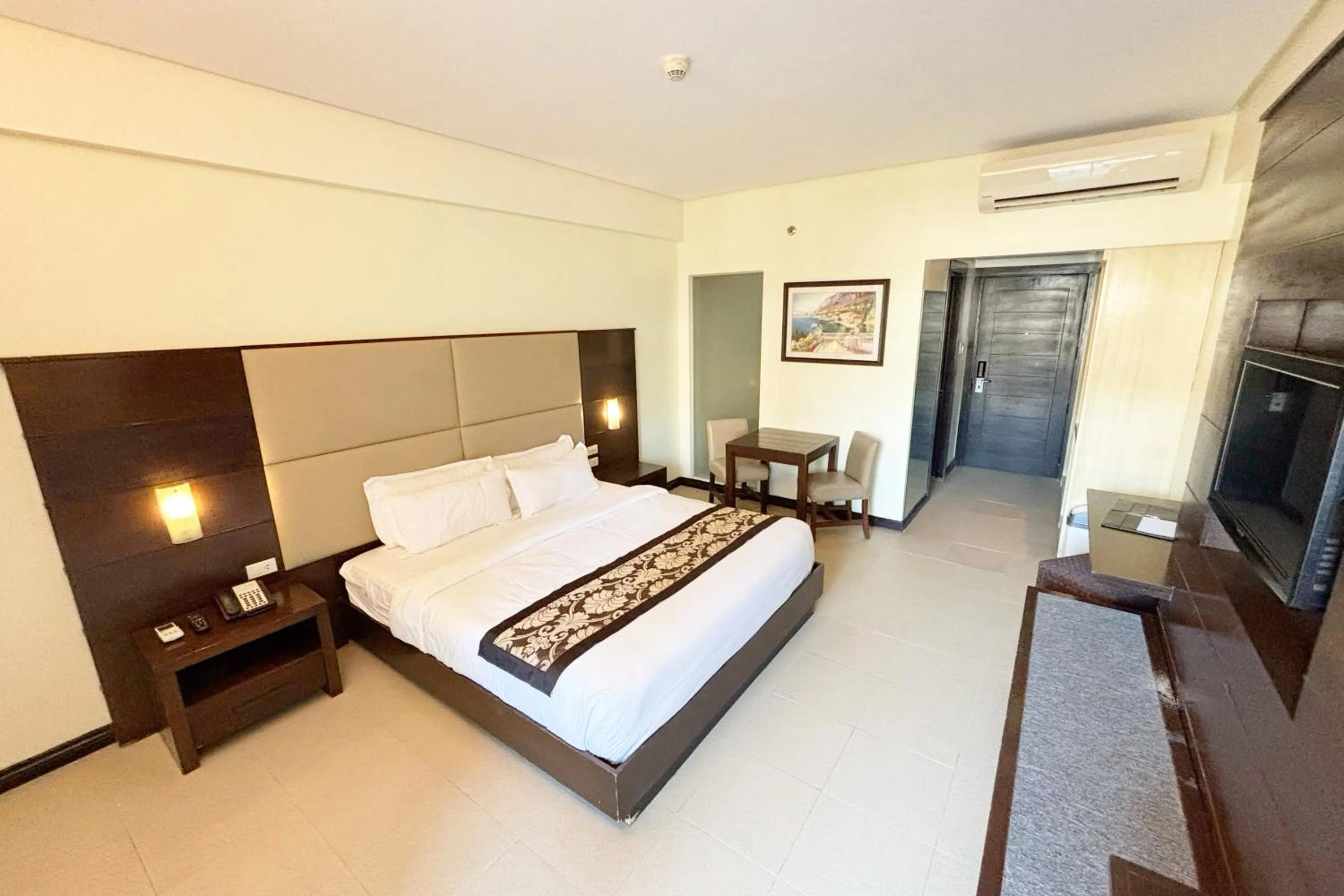 Bed in The Muse Beach Front Hotel Boracay