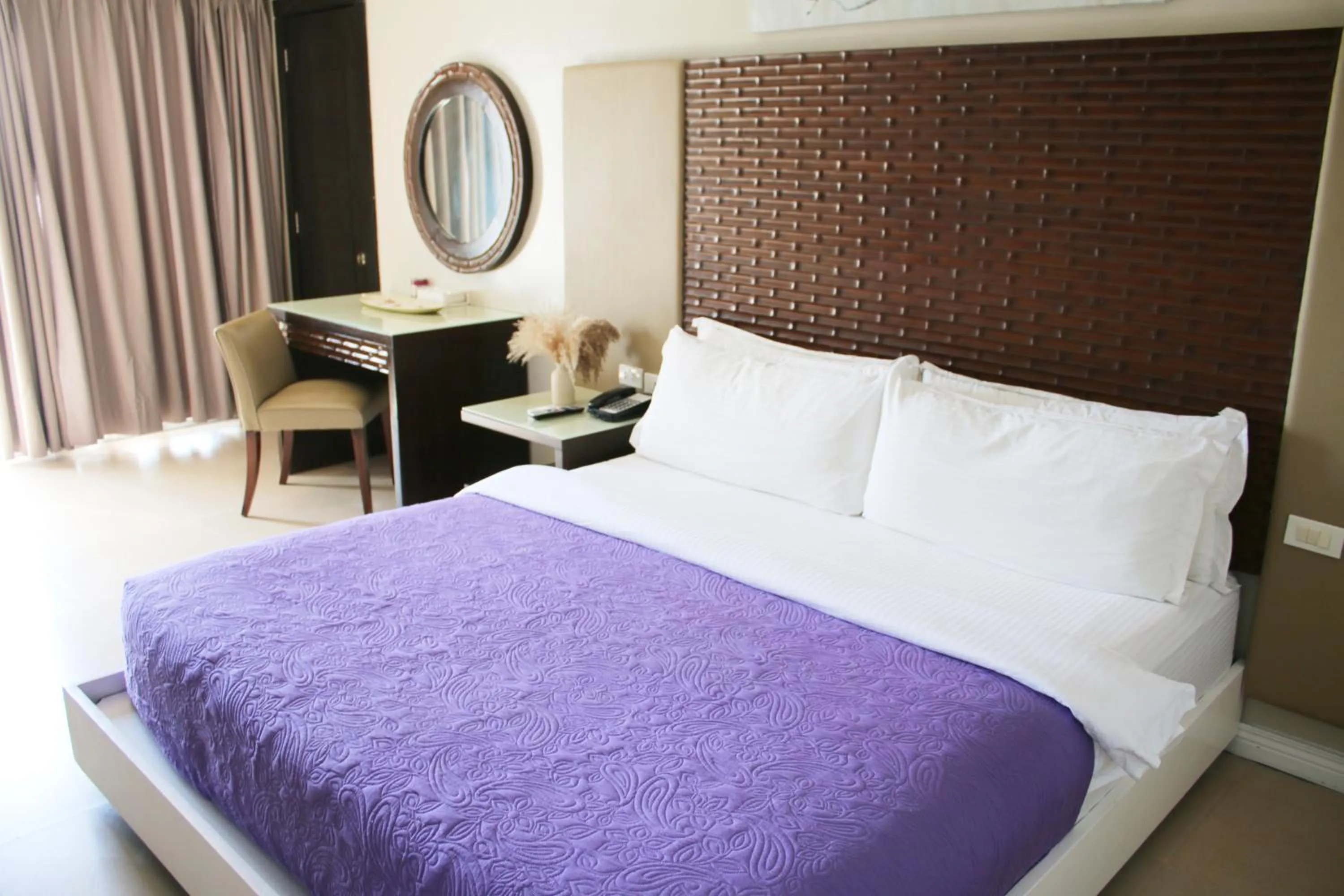 Bed in The Muse Beach Front Hotel Boracay