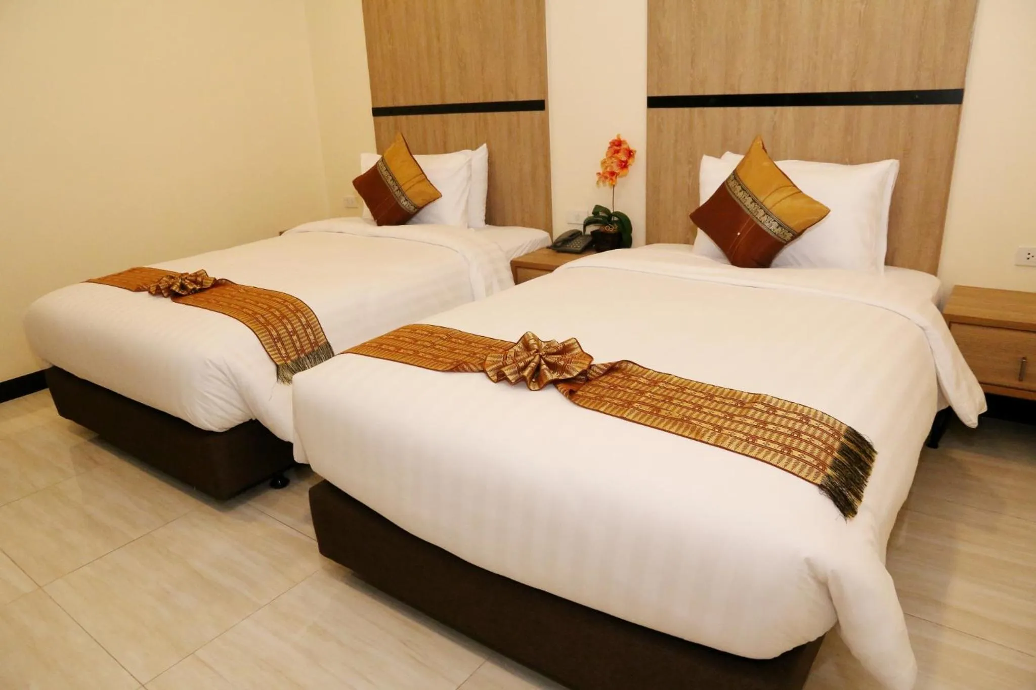Bed in Crystal Palace Luxury Hotel Pattaya