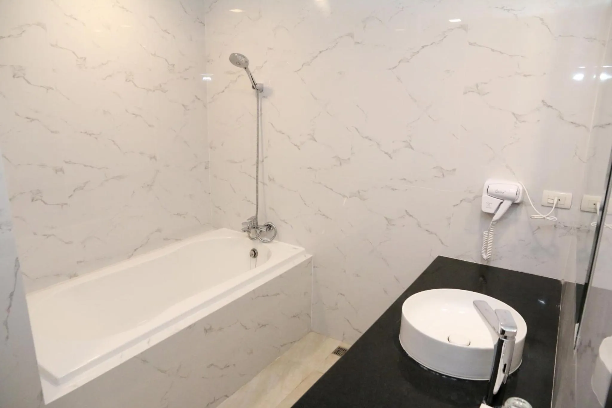 Shower in Crystal Palace Luxury Hotel Pattaya