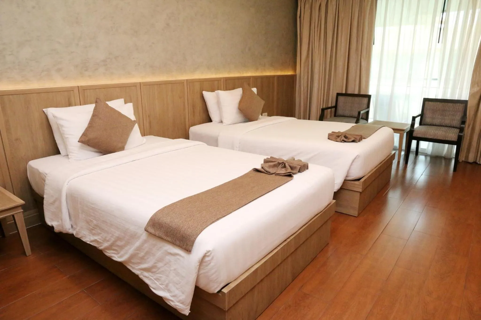 Bed in Crystal Palace Luxury Hotel Pattaya
