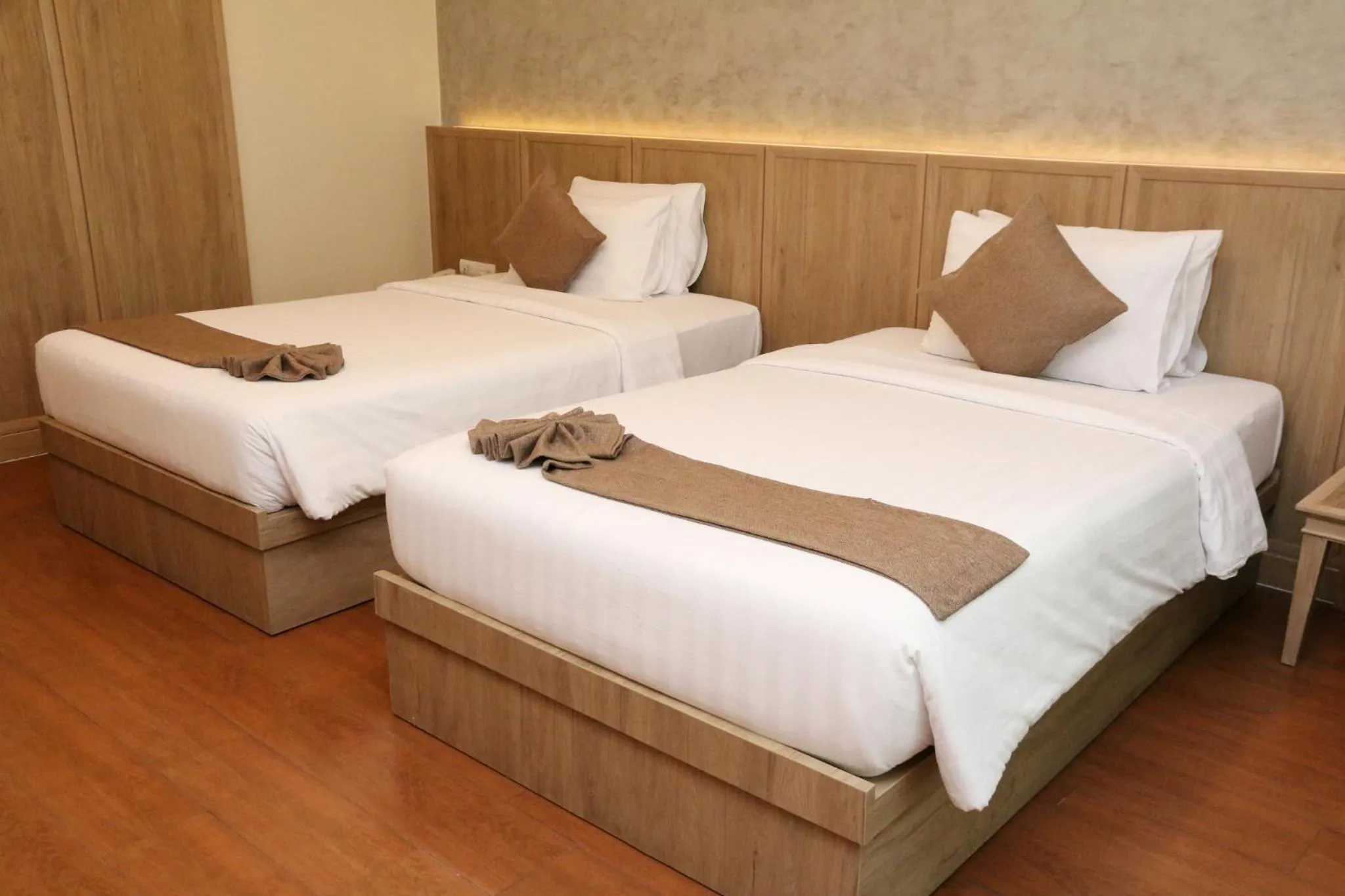 Bed in Crystal Palace Luxury Hotel Pattaya