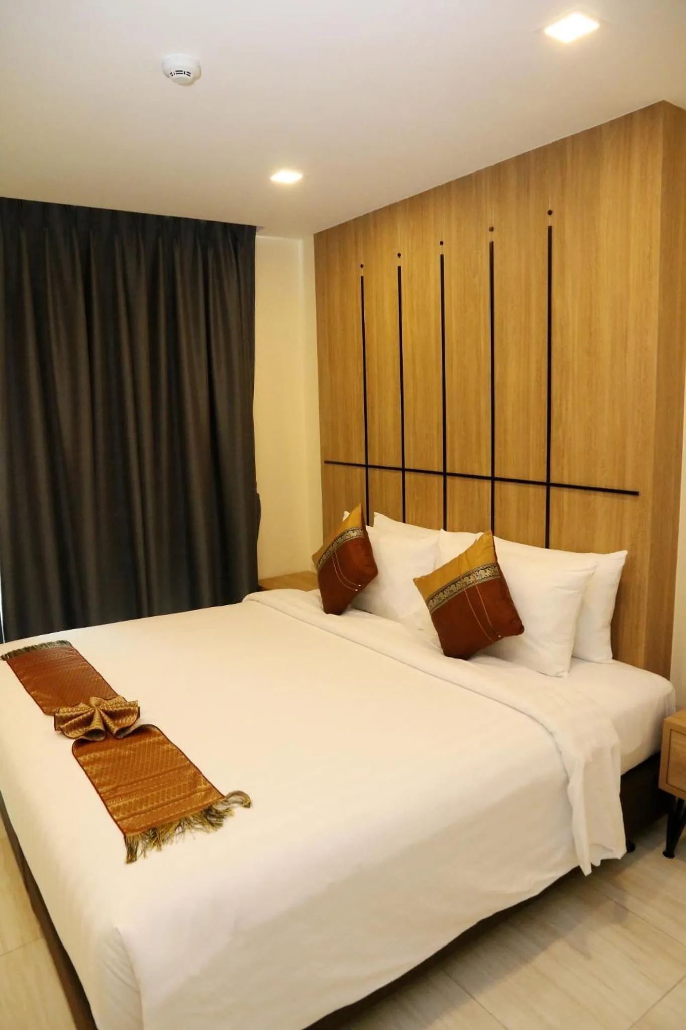 Bed in Crystal Palace Luxury Hotel Pattaya