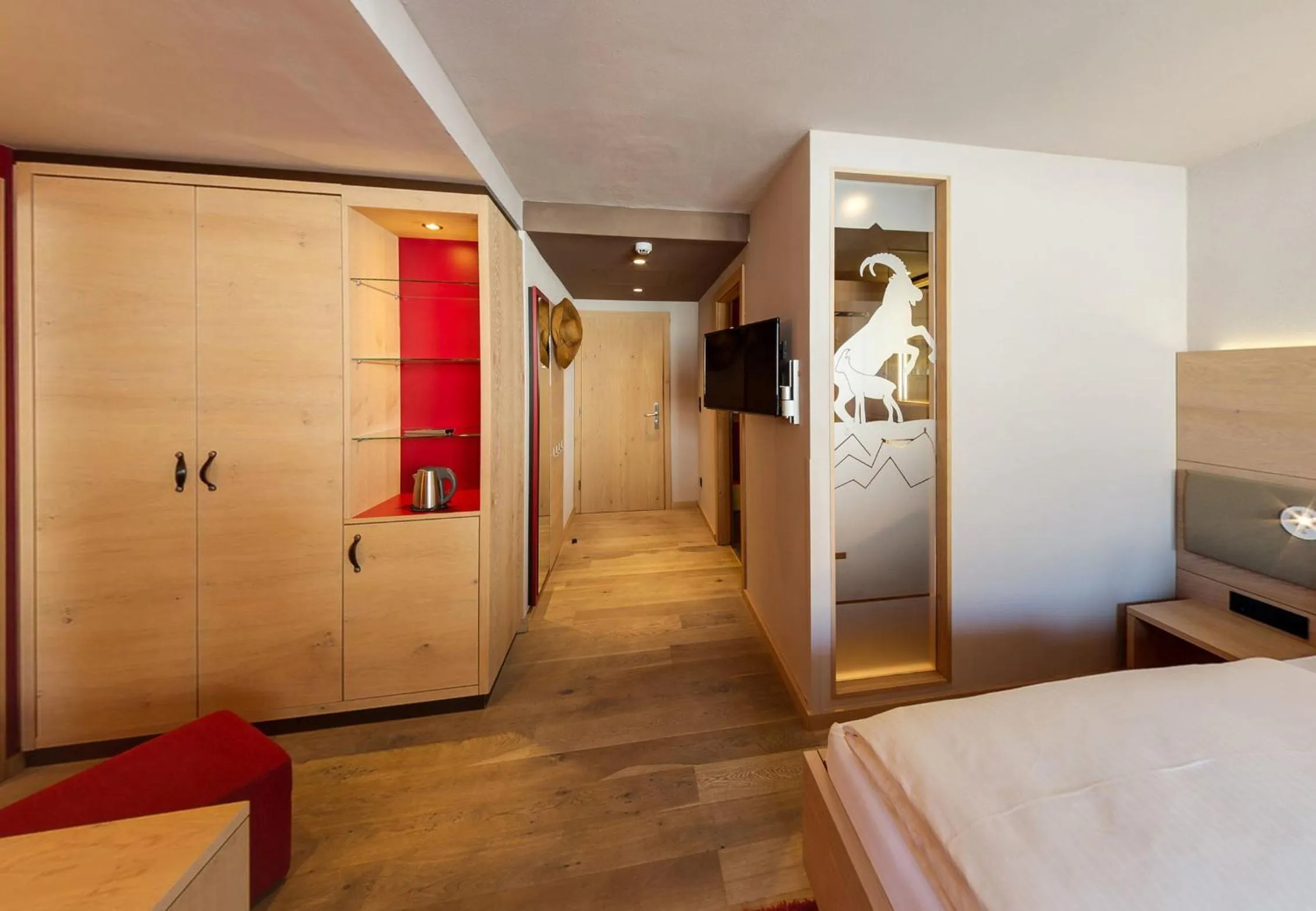 Bed in Familotel Alphotel