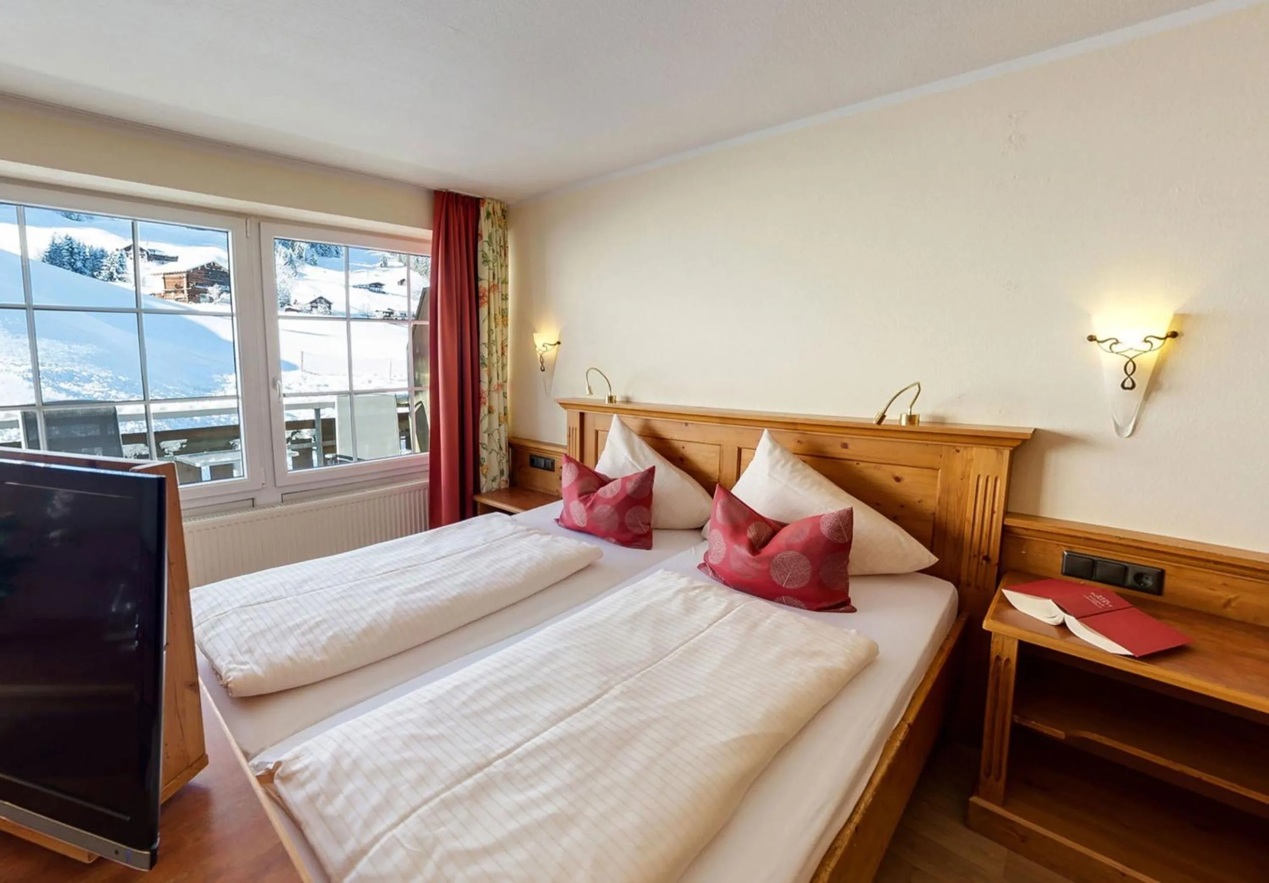 Bed in Familotel Alphotel