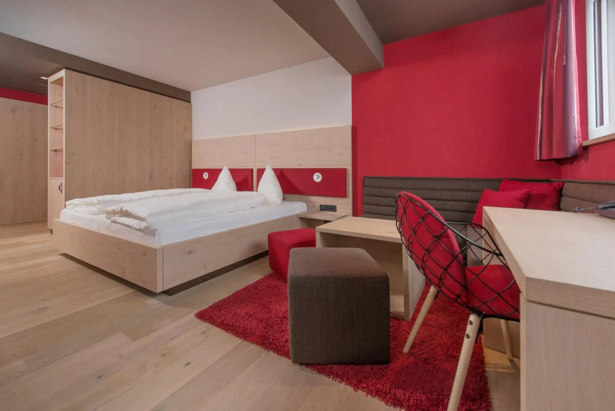 Bed in Familotel Alphotel