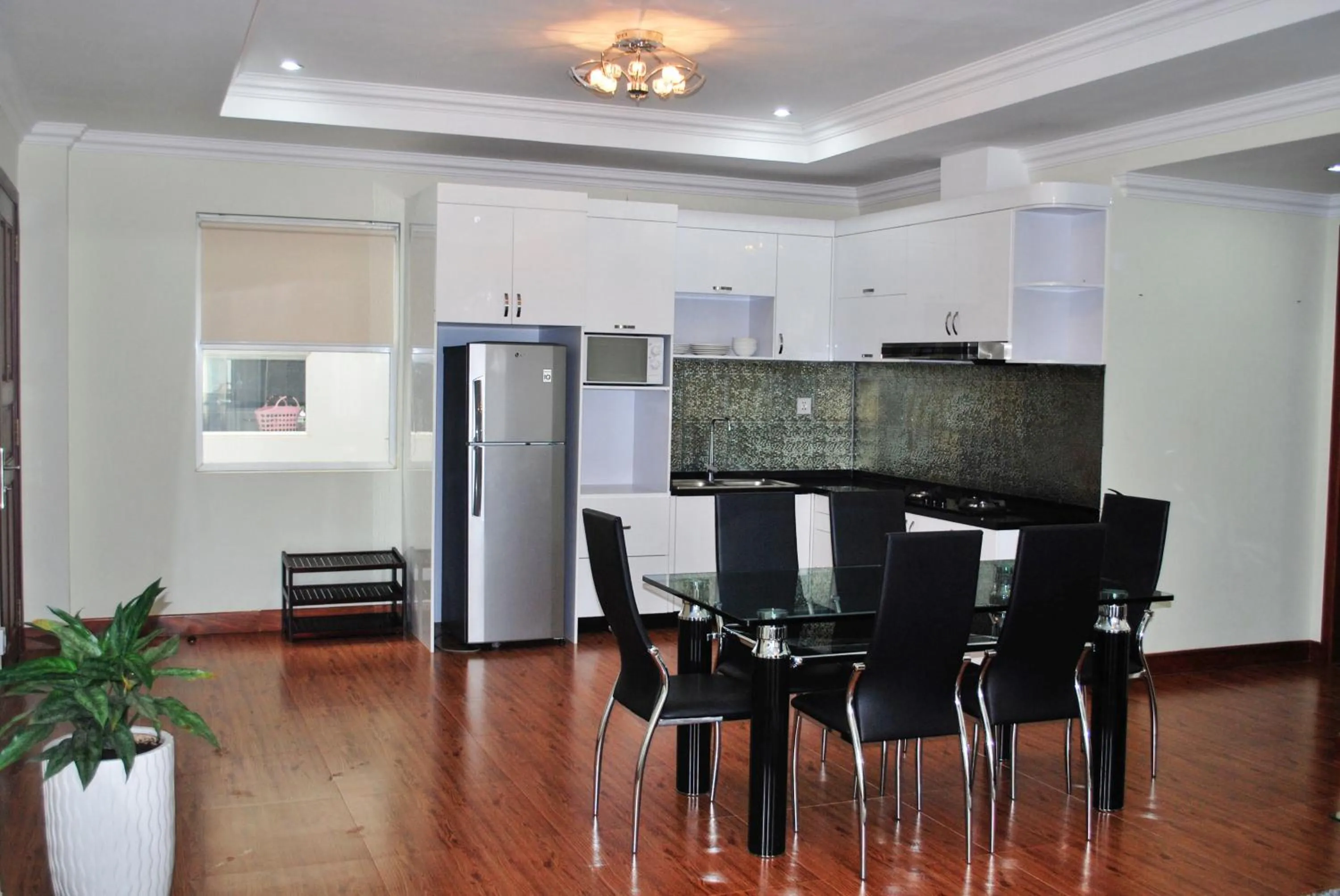 Kitchen or kitchenette in KT Apartment